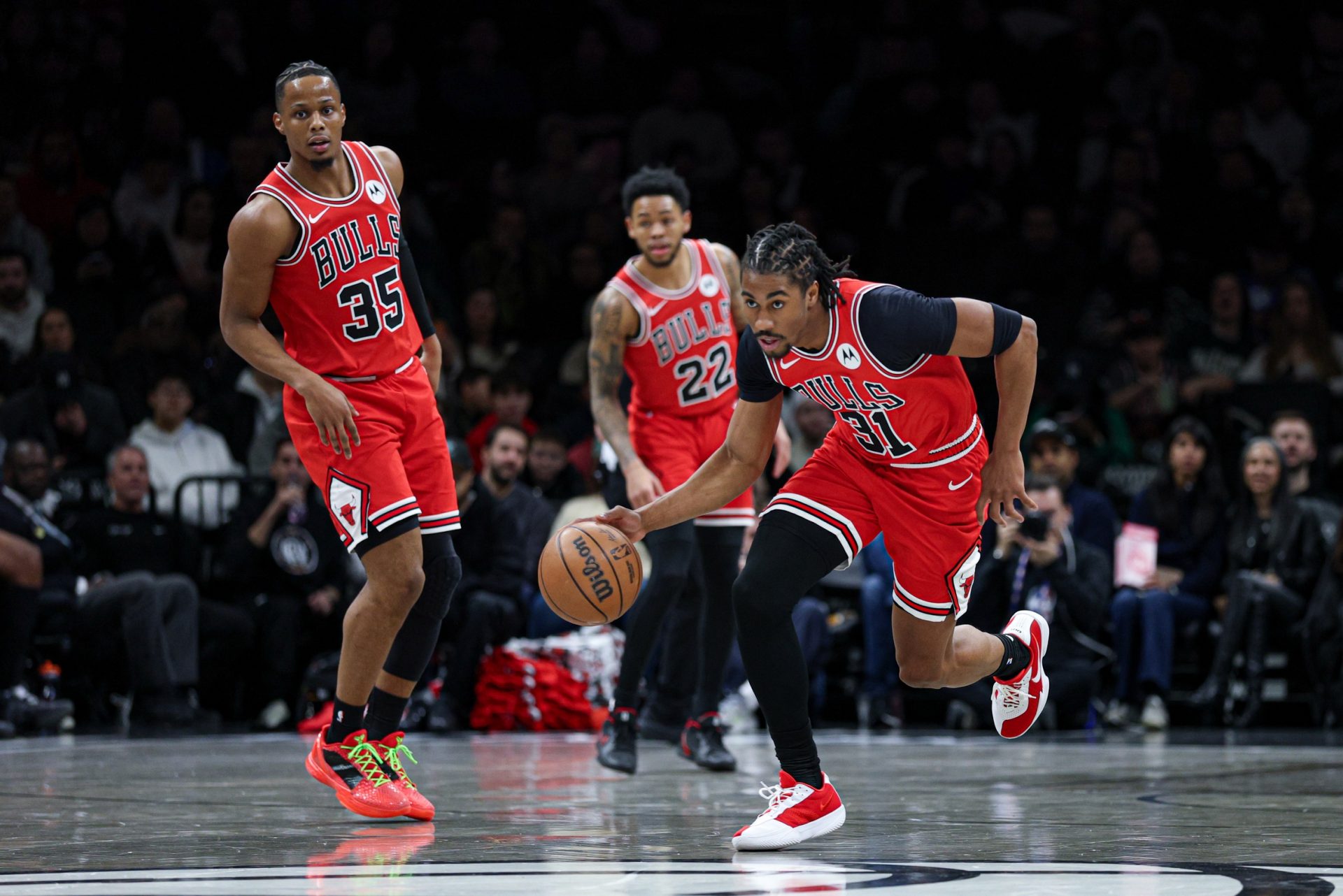 Chicago Bulls guard Jaden Ivey (31) dribbles up court against the Brooklyn Nets. - Source: Imagn