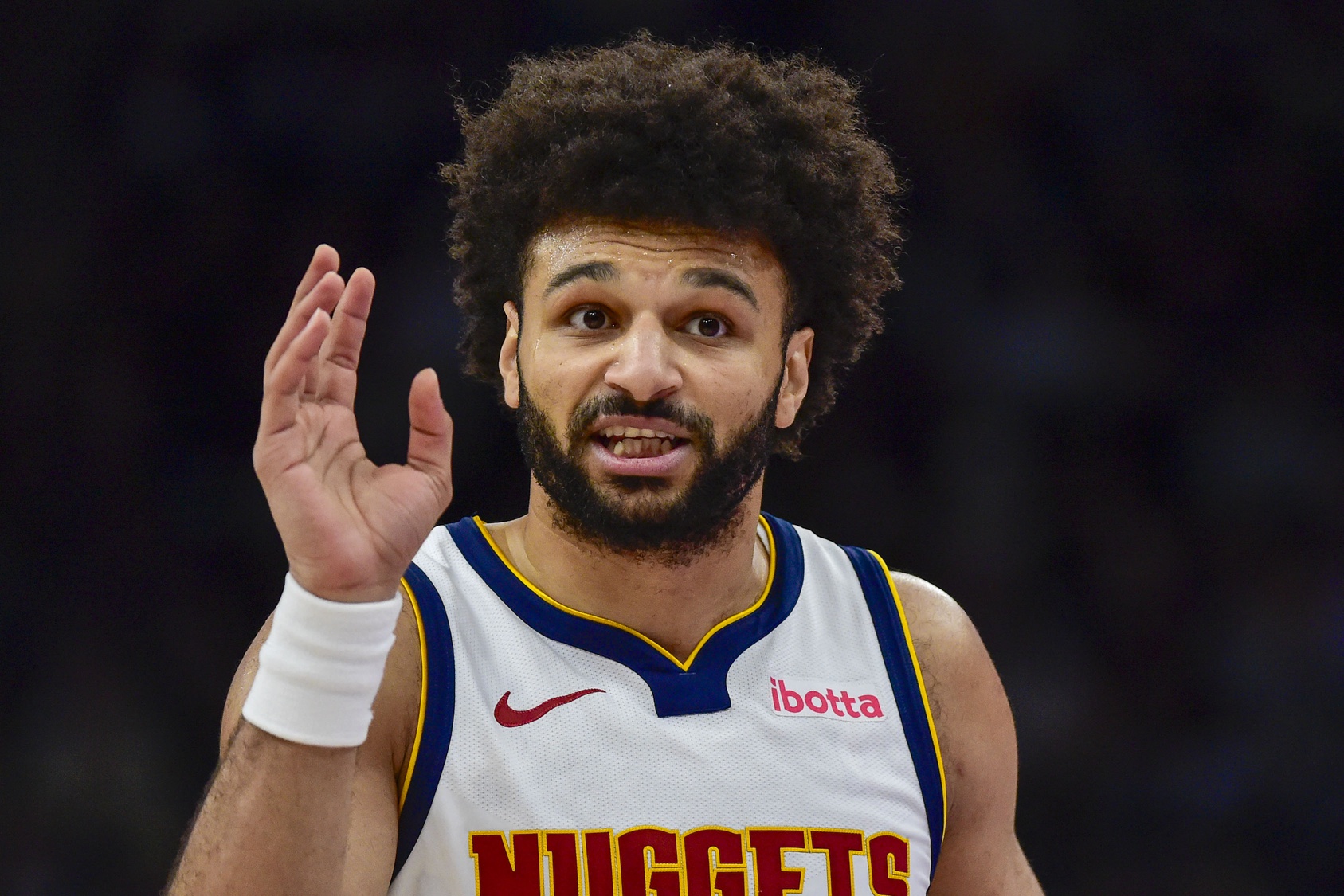 Denver Nuggets guard Jamal Murray (27) pleads his case for a foul during the first half against the Utah Jazz at Delta Center.