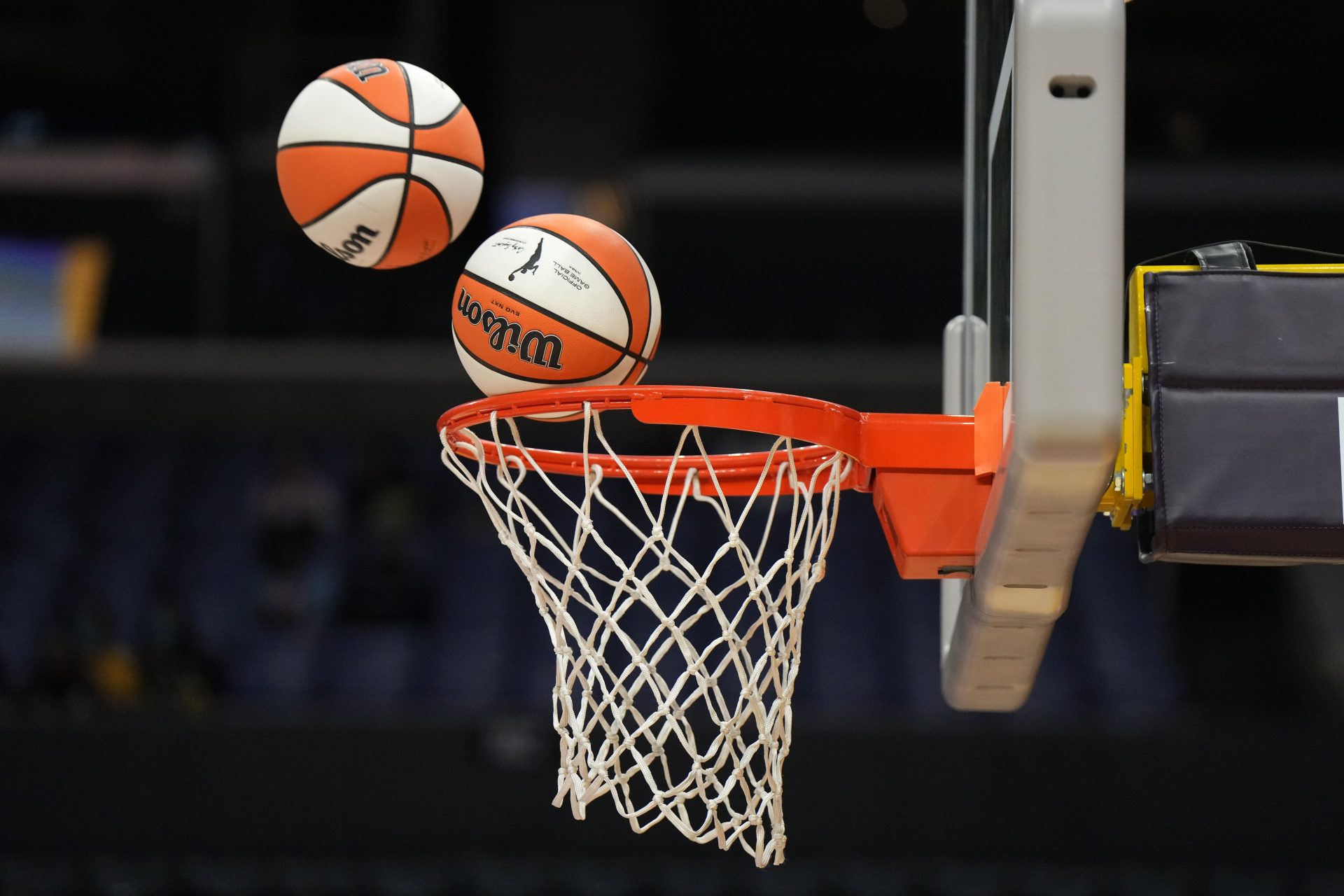 Wilson official basketballs with WNBA logo go through the net during the game between the LA Sparks and the Las Vegas Aces at Crypto.com Arena -Source: USA TODAY Sports