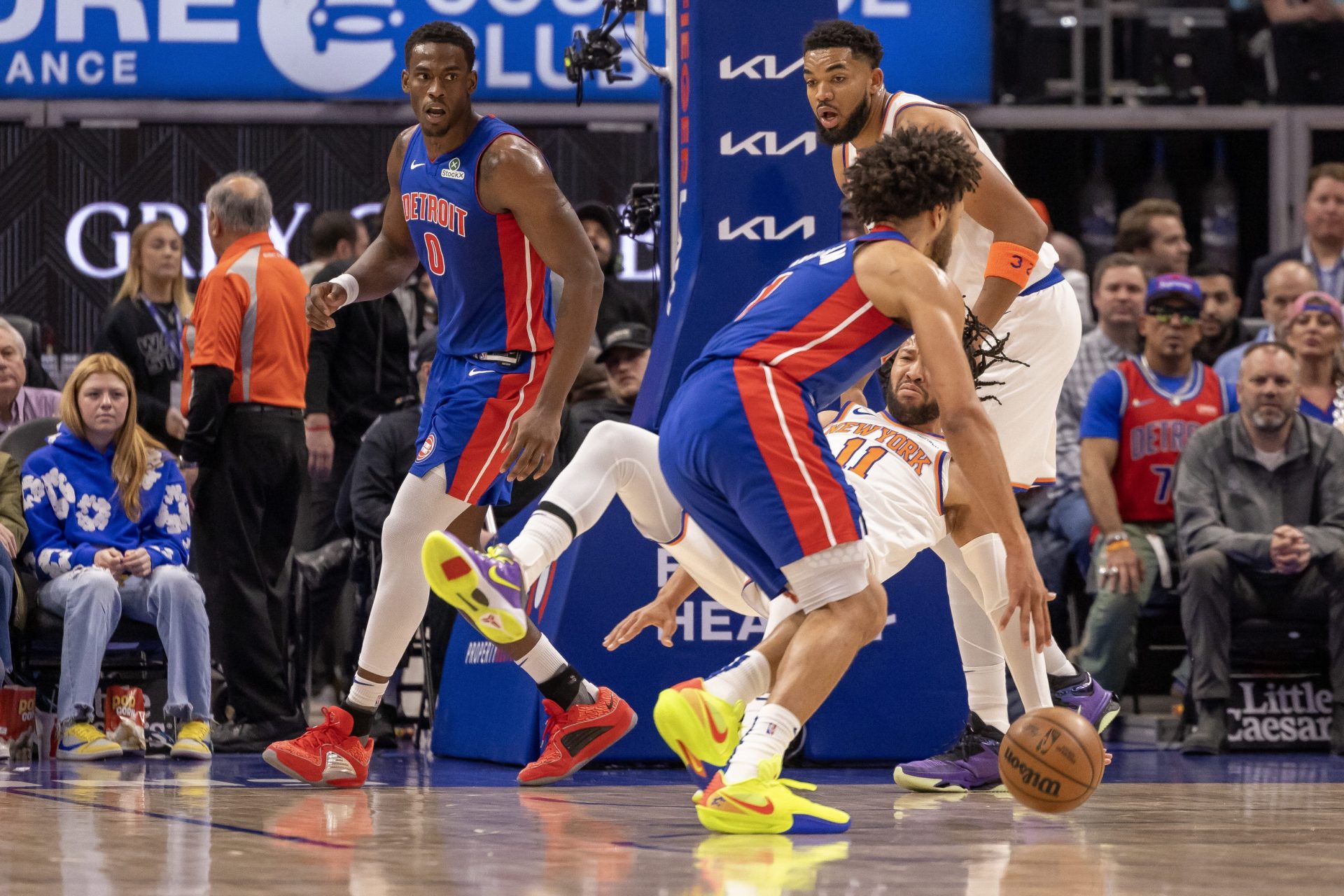 Detroit Pistons guard Cade Cunningham (2) runs over New York Knicks guard Jalen Brunson (11) going to the basket during the first half at Little Caesars Arena - Source: Imagn Images