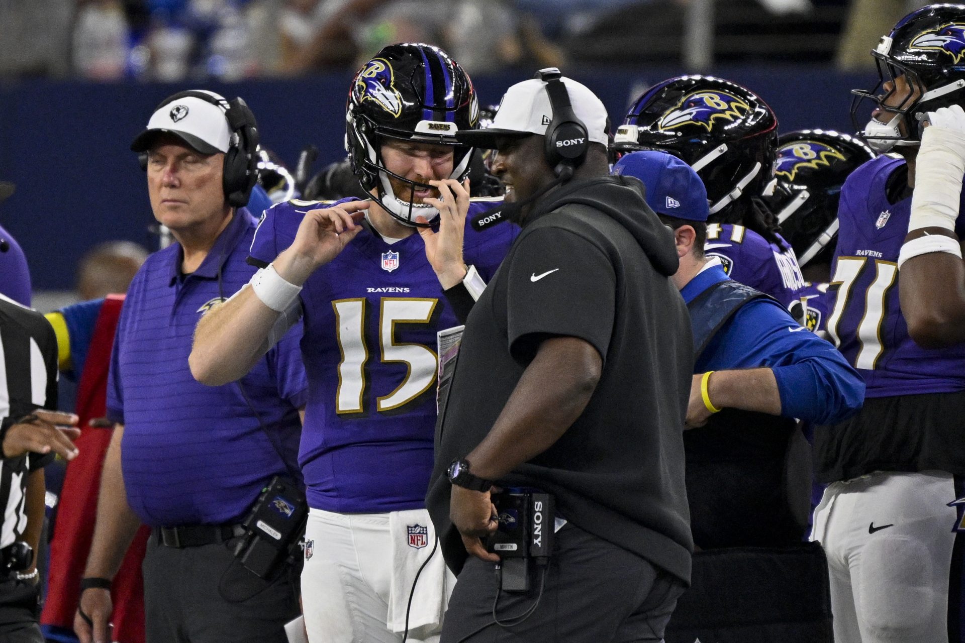 Baltimore Ravens quarterback Cooper Rush (15) talks with quarterbacks coach Tee Martin during the game between the Dallas Cowboys and the Baltimore Ravens at AT&T Stadium. Source: Jerome Miron-Imagn Images