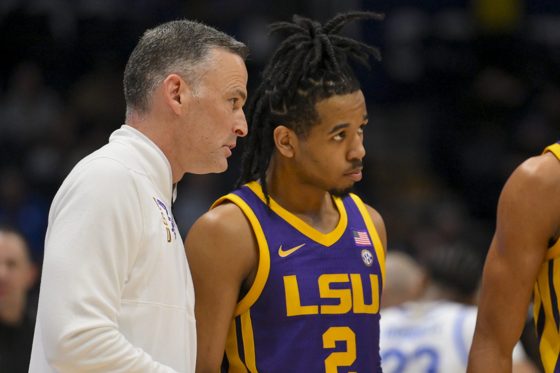 Louisiana State Tigers head coach Matt McMahon talks with guard Jalen Reece (2) during a break in action during the second half at Bridgestone Arena - Source: Imagn