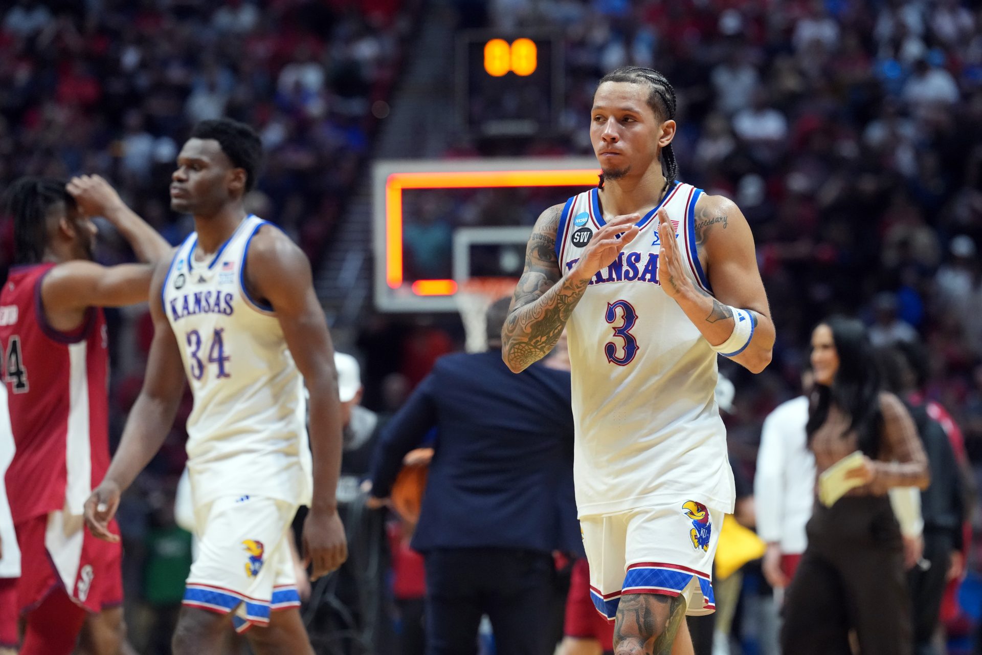 Kansas Jayhawks guard Tre White (3) reacts after a loss against the St. John's Red Storm during a second round game of the men's 2026 NCAA Tournament at Viejas Arena. Source: Kirby Lee-Imagn Images