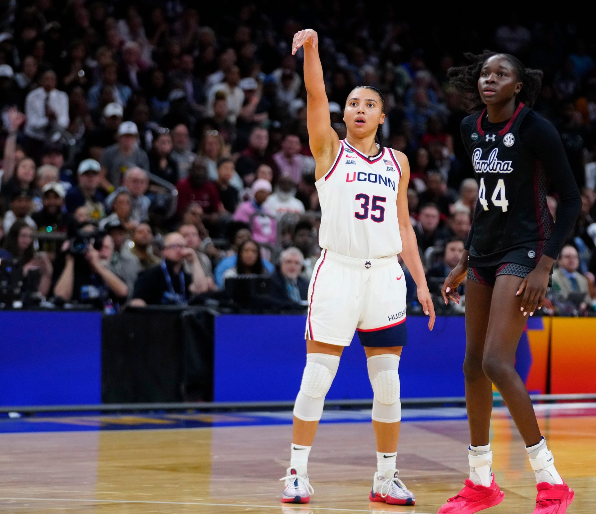 Connecticut guard Azzi Fudd (35) makes a three-pointer against South Carolina at Mortgage Matchup Center during the Women's Final Four in Phoenix on April 3, 2026 - Source: Imagn Images