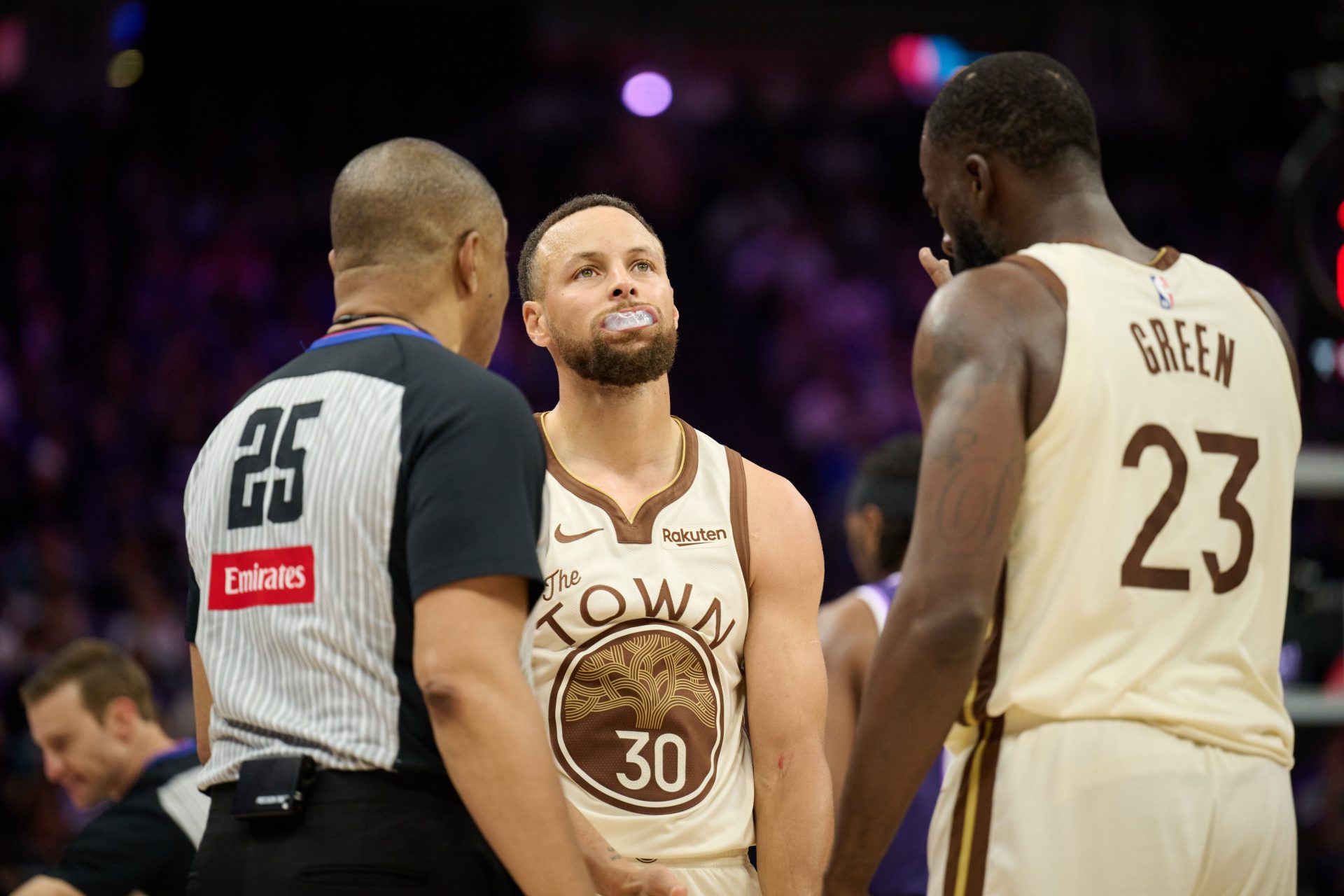 Golden State Warriors guard Steph Curry (30) and forward Draymond Green (23) talk with referee Tony Brothers (25) - Source: Imagn