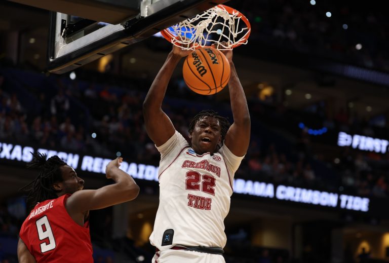 Alabama Crimson Tide forward Aiden Sherrell (22) dunks past Texas Tech Red Raiders forward Luke Bamgboye (9) in the first half during a second round game of the men's 2026 NCAA Tournament at Benchmark International Arena - Source: Imagn