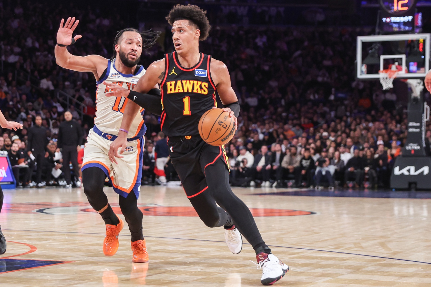 Atlanta Hawks forward Jalen Johnson (1) drives past New York Knicks guard Jalen Brunson (11) in the third quarter at Madison Square Garden - Source: Imagn Images