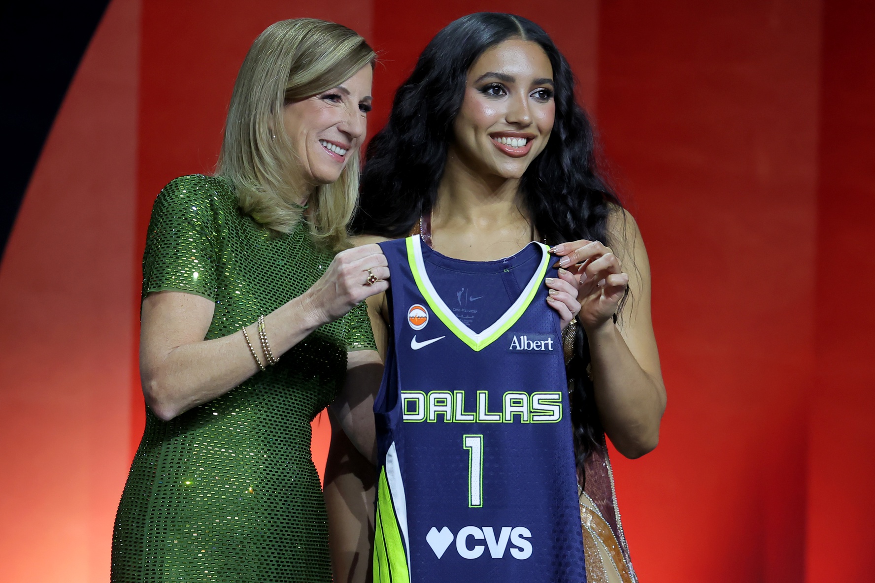 WNBA Commissioner Cathy Engelbert (left) poses for photos with Azzi Fudd who was selected first overall by the Dallas Wings during the 2026 WNBA Draft at The Shed at Hudson Yards - Source: Imagn Images