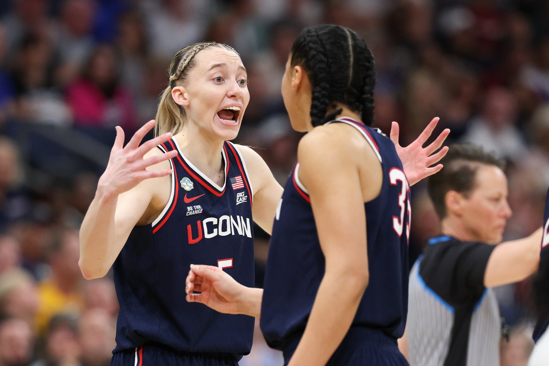 Connecticut Huskies guard Paige Bueckers (5) and guard Azzi Fudd (35) speak during the second half against the South Carolina Gamecocks of the national championship of the women's 2025 NCAA tournament at Amalie Arena - Source: Imagn Images