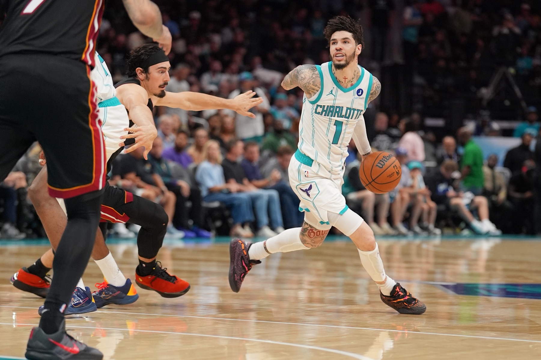 Charlotte Hornets guard LaMelo Ball (1) moves the ball during the second half during the play-in rounds between the Charlotte Hornets and the Miami Heat of the 2026 NBA Playoffs at Spectrum Center. - Source: Imagn