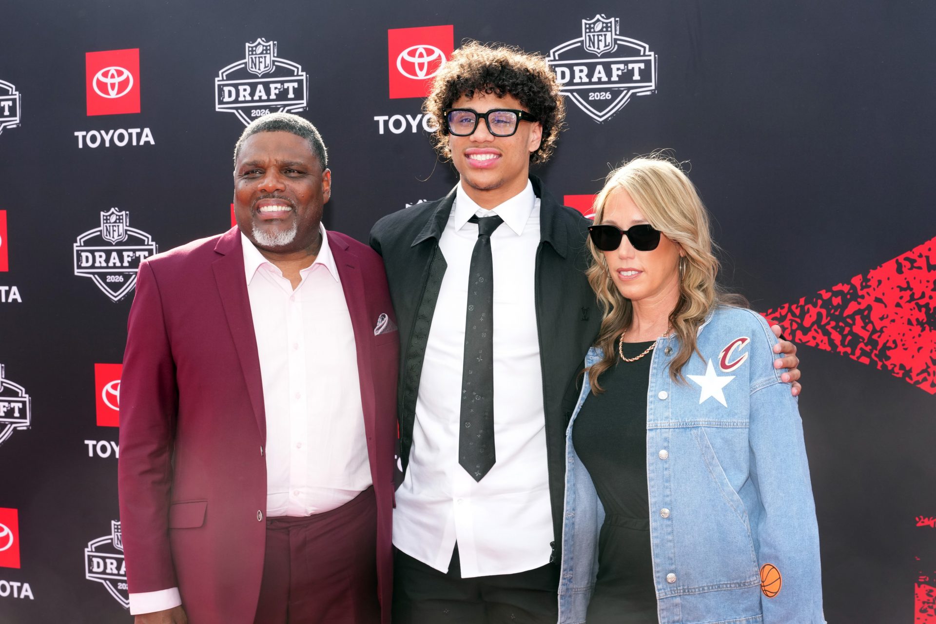 Arizona State Sun Devils receiver Jordyn Tyson poses with his parents John Tyson and Sandra Brown on the red carpet before the 2026 NFL Draft at Point State Park. Source: Imagn