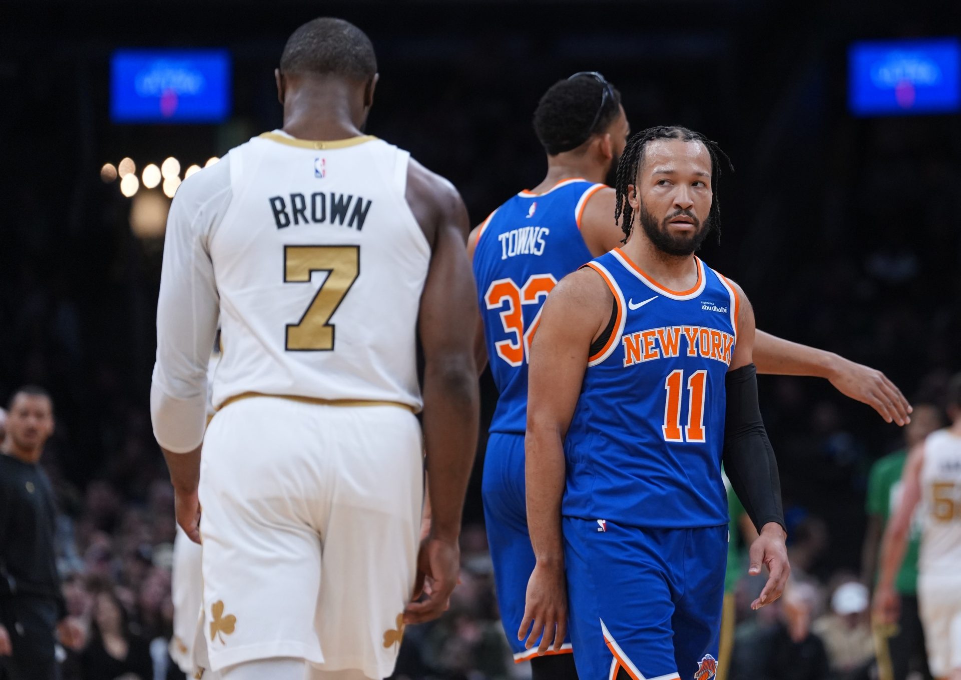 New York Knicks guard Jalen Brunson (11) looks at Boston Celtics guard Jaylen Brown (7) after a play in the first quarter at TD Garden.