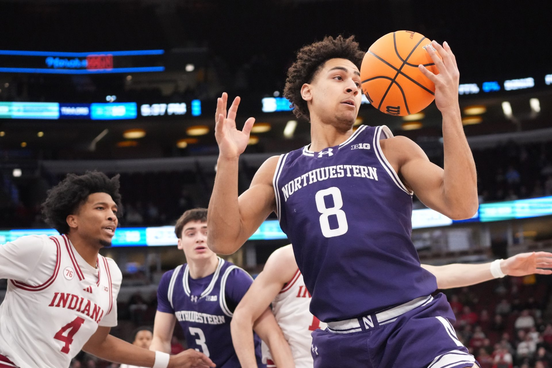 Northwestern Wildcats forward Tre Singleton (8) grabs a rebound against the Indiana Hoosiers during the first half at United Center. Source: Imagn