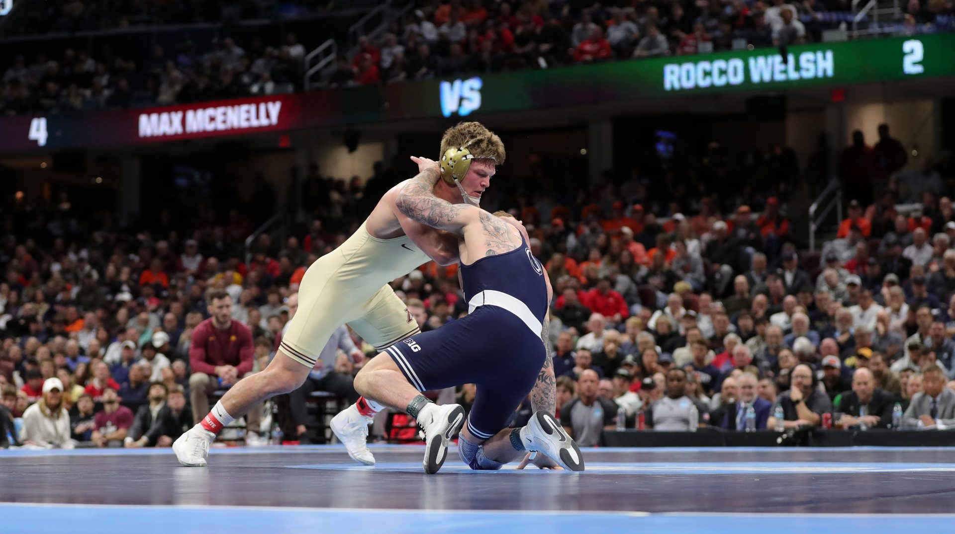 Max McEnelly, top, vs Penn State’s Rocco Welsh - IMAGN