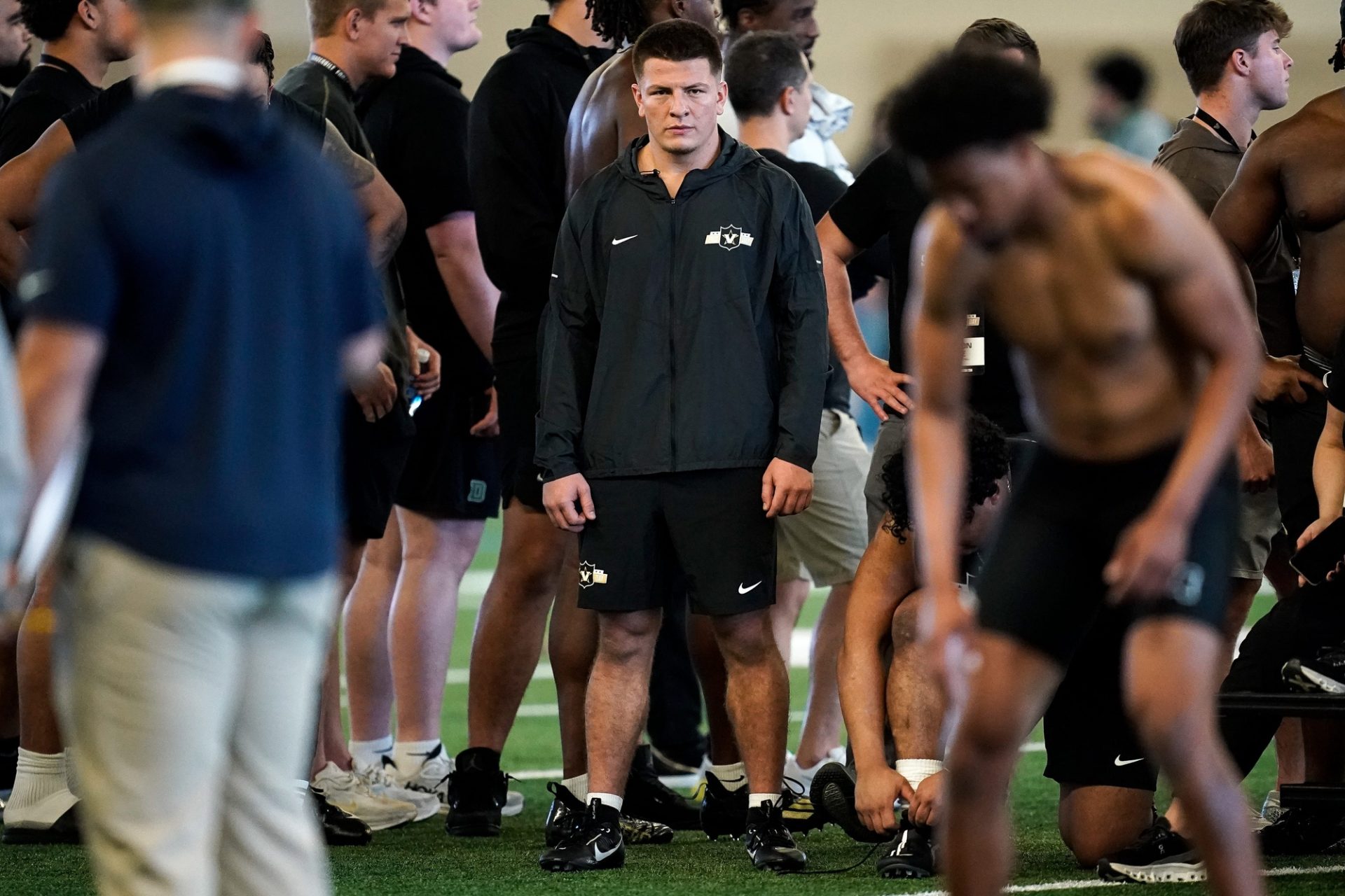 Vanderbilt quarterback Diego Pavia watches his teammates during football pro day at Vanderbilt University in Nashville, Tenn., Friday, March 20, 2026.
