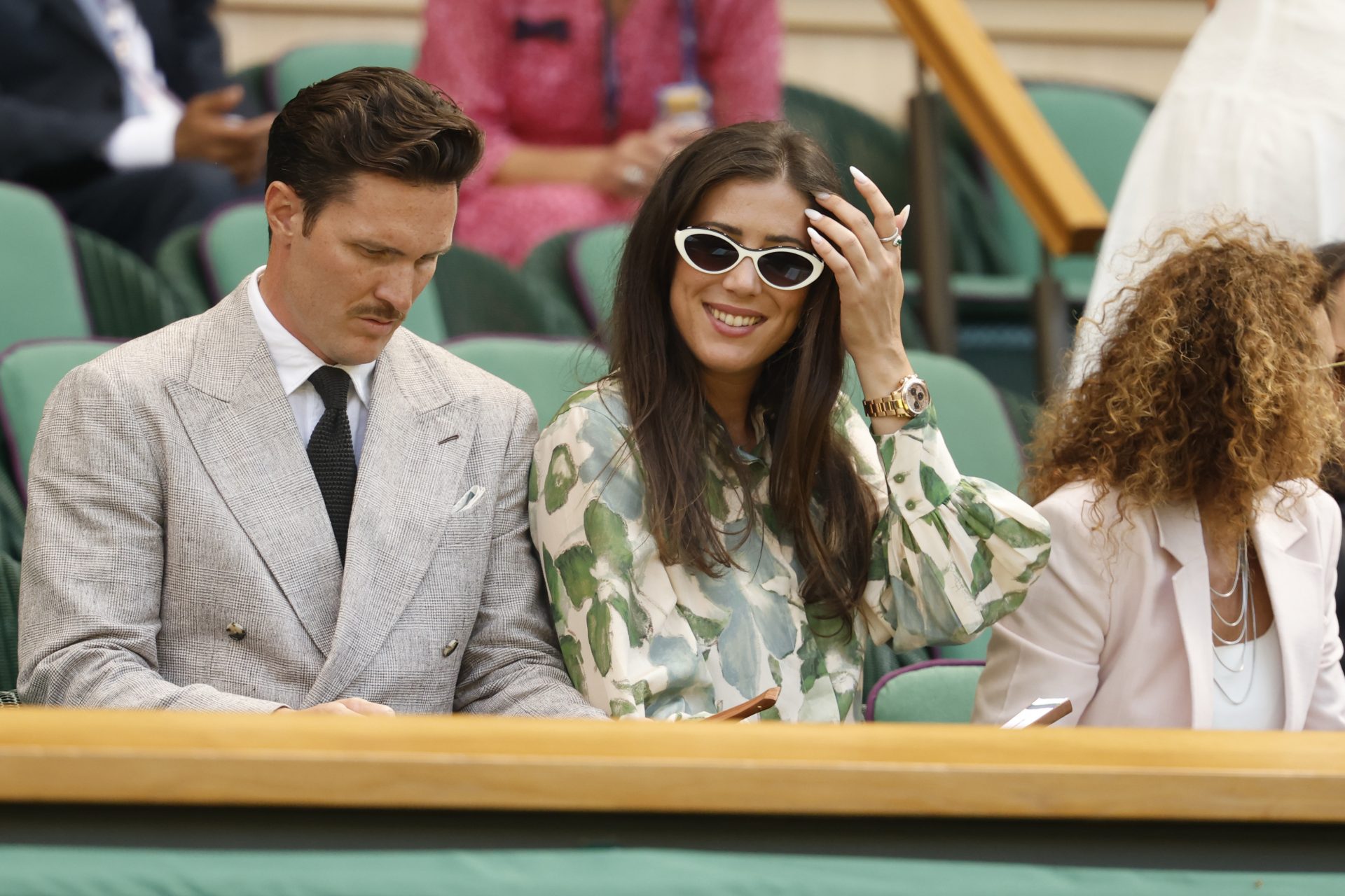 Former Wimbledon ladies' singles champion Garbine Muguruza (M) sits in the Royal Box prior to the match between Iga Swiatek (POL) and Amanda Anisimova (USA)(both not pictured) in the ladies' singles championship on day thirteen of The Championships Wimbledon 2025 at All England Lawn Tennis and Croquet Club. Source: Imagn