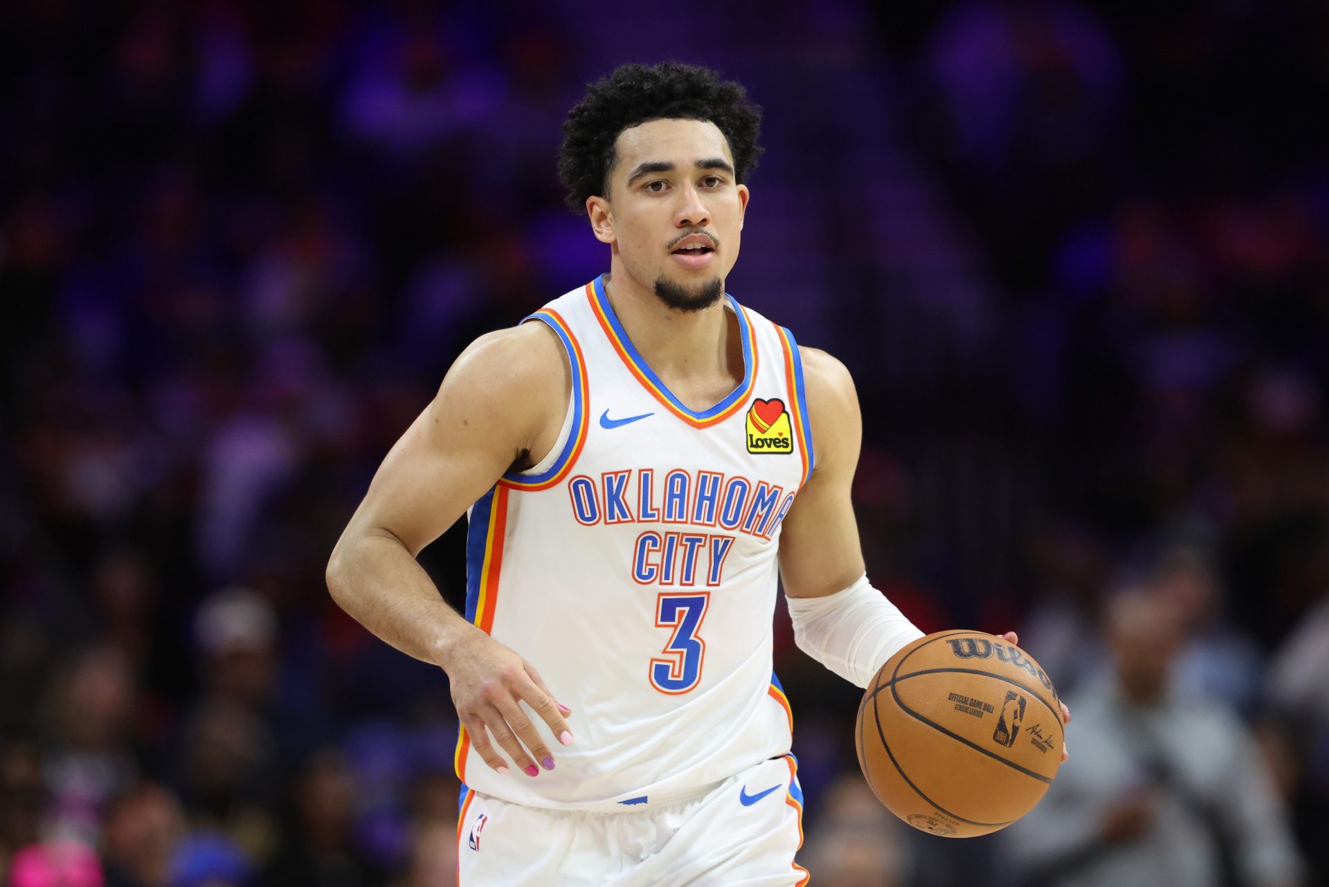Oklahoma City Thunder guard Jared McCain (3) dribbles the ball against the Philadelphia 76ers during the fourth quarter at Xfinity Mobile Arena. - Source: Imagn