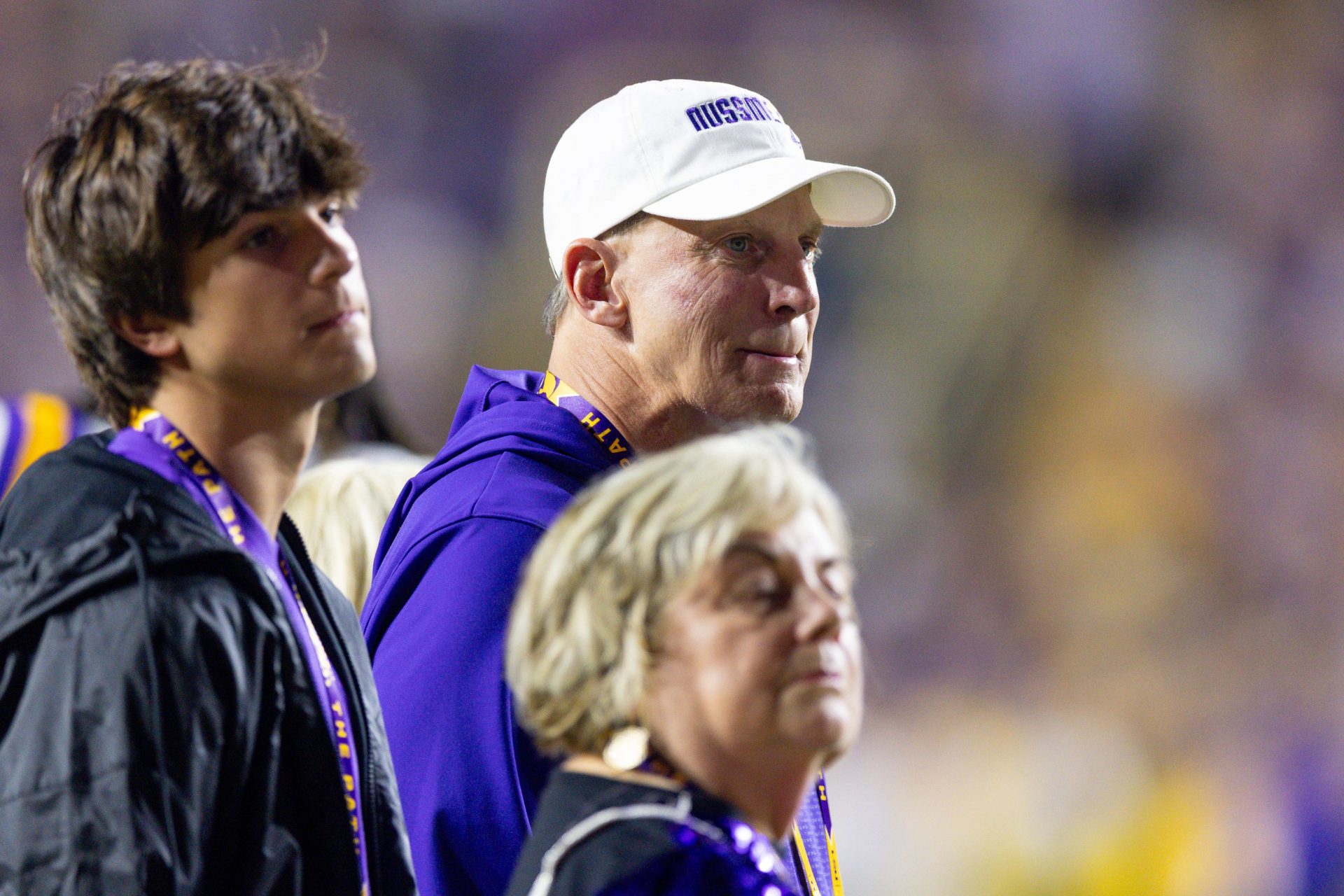 LSU Tigers quarterback Garrett Nussmeier (not pictured) father Doug (white hat) and brother Colton looks on against the Western Kentucky Hilltoppers during the pre-game at Tiger Stadium. Source: Imagn