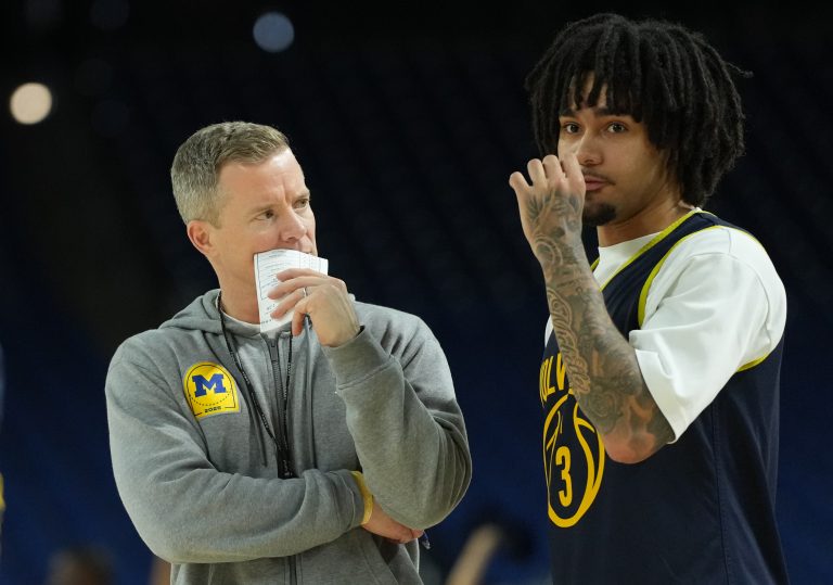 Michigan Wolverines head coach Dusty May talks with Michigan Wolverines guard Elliot Cadeau (3) during a practice. Source: IMAGN