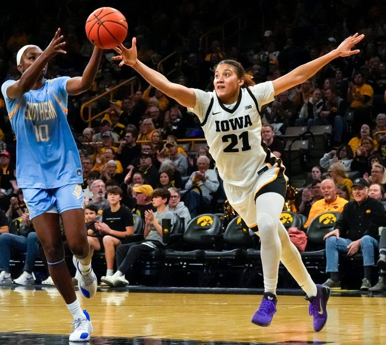 Iowa guard Emely Rodriguez (21) attempts to intercept an inbounds pass to Southern guard Demonnie Lagway (10) Nov. 3, 2025 during a women’s college basketball game at Carver-Hawkeye Arena in Iowa City, Iowa - Source: Imagn