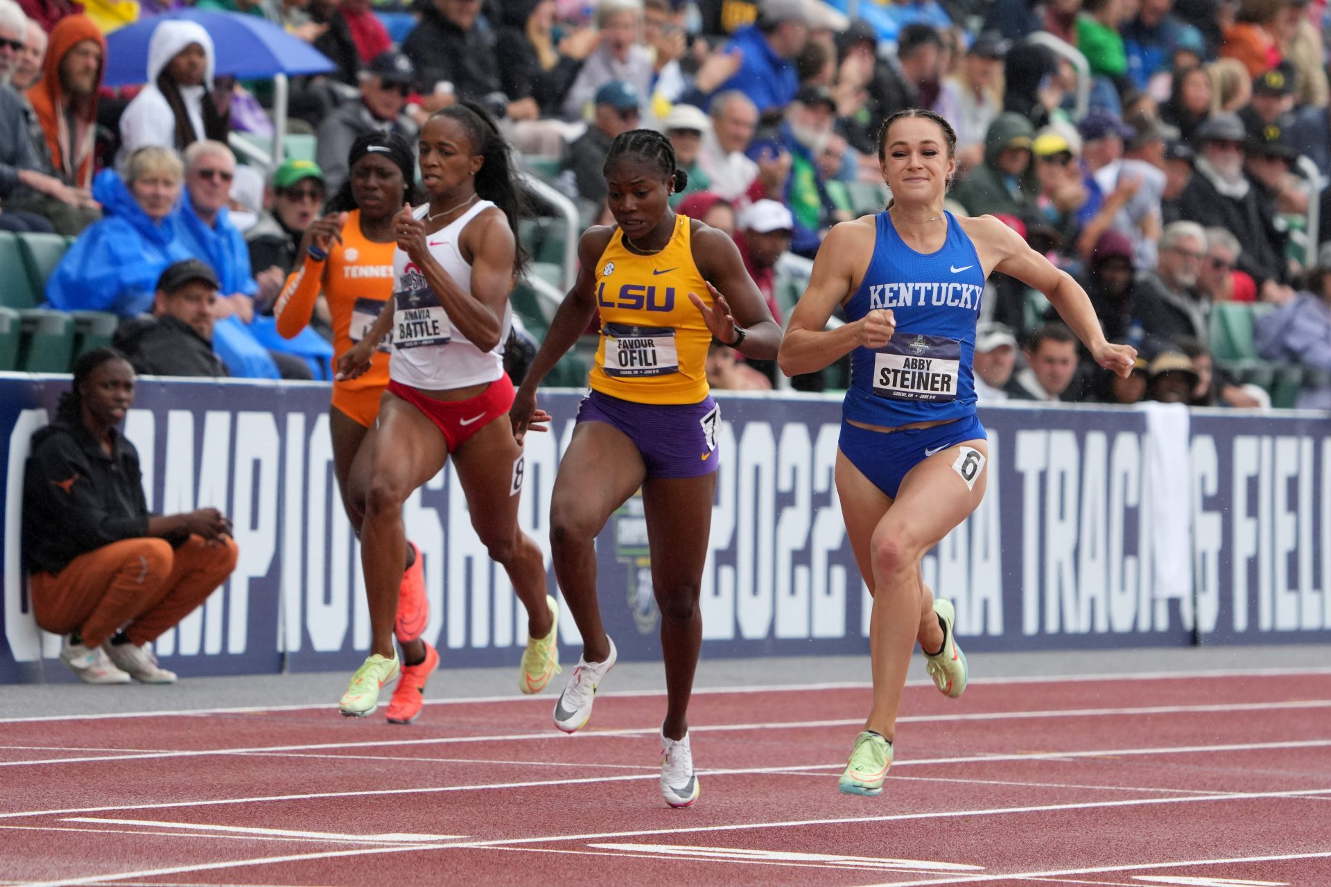 Abby Steiner of Kentucky celebrates after defeating Favour Ofili of LSU to win the women's 200m in a collegiate record 21.80 during the NCAA Track and Field Championships at Hayward Field.