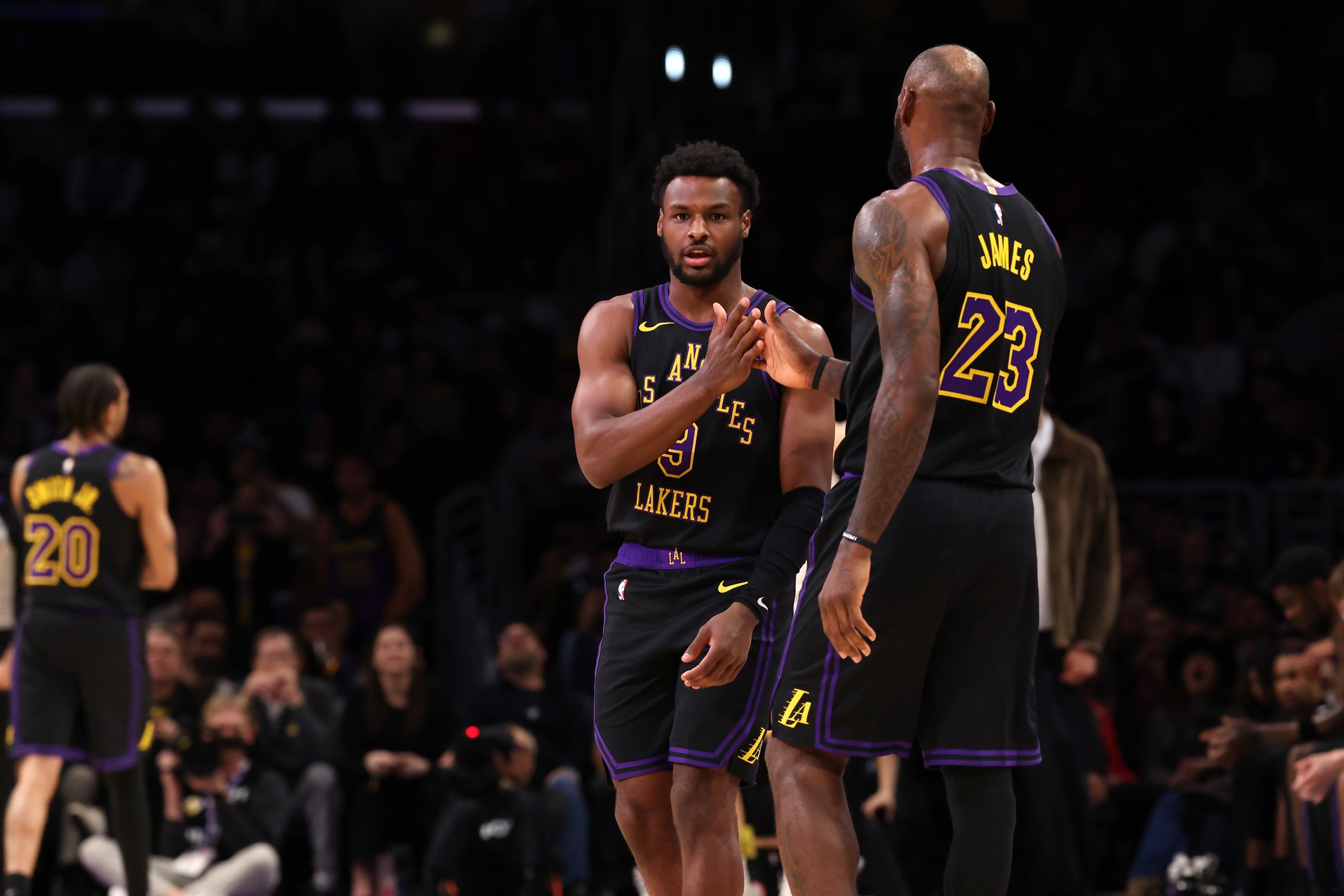 Los Angeles Lakers forward LeBron James (23) greets guard Bronny James (9) as Bronny enters the game for LeBron during the fourth quarter against the Atlanta Hawks at Crypto.com Arena. - Source: Imagn