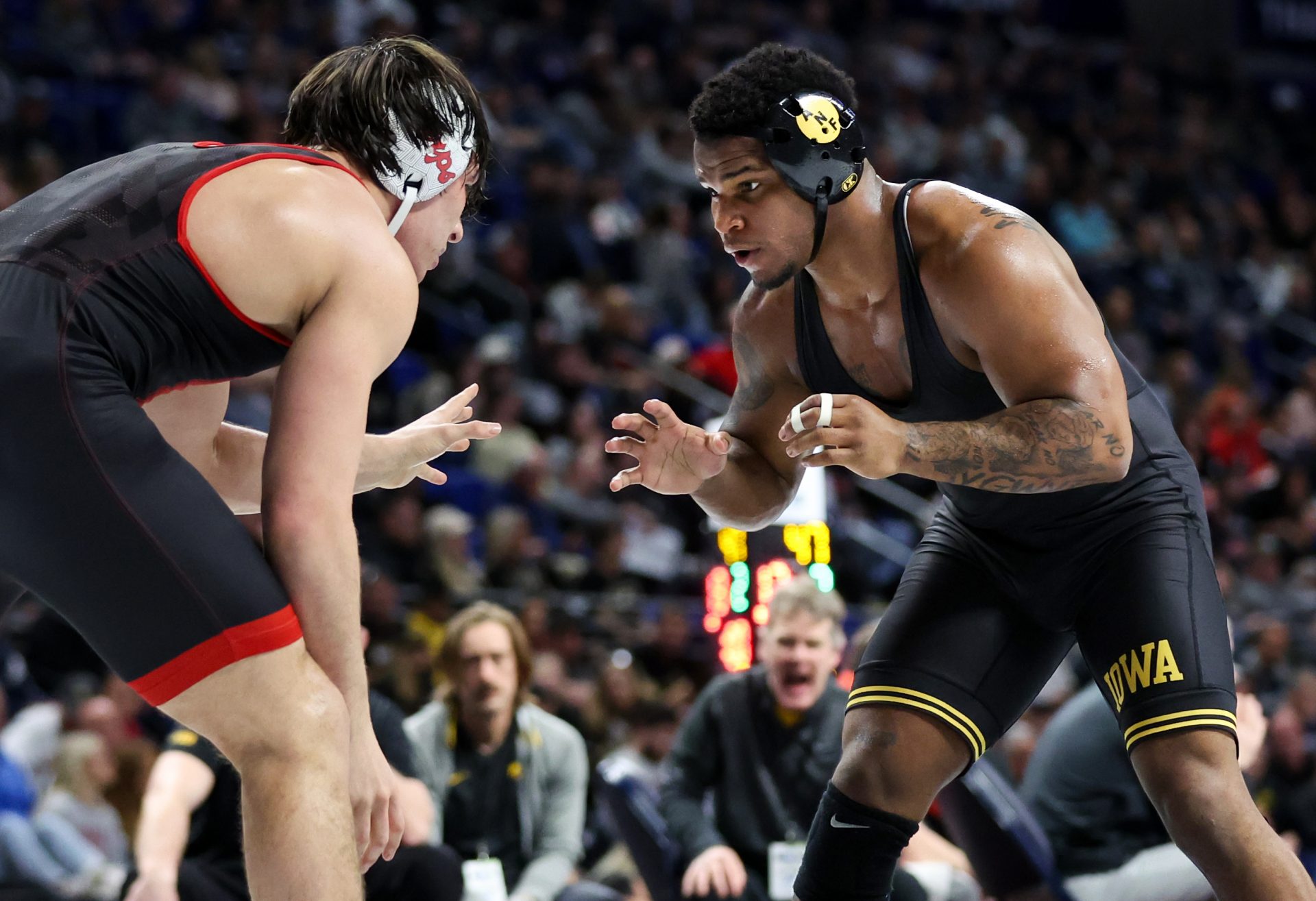 Gabe Arnold (right)  during the Big Ten Wrestling Championships at Bryce Jordan Center. (Source: Imagn Images)