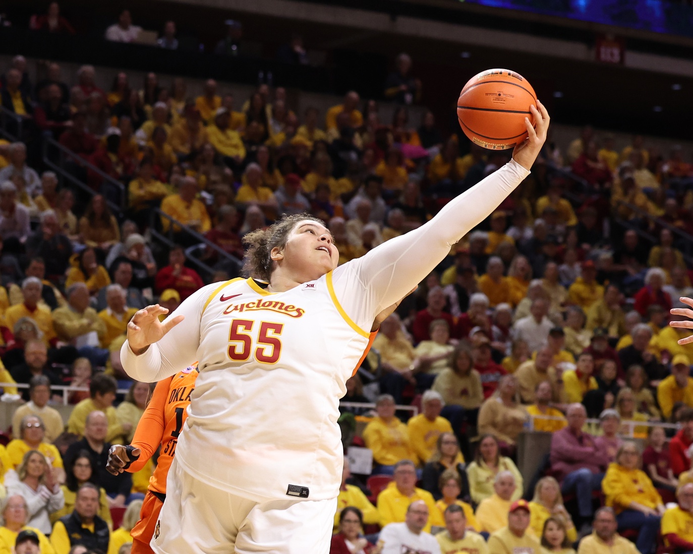 Iowa State Cyclones center Audi Crooks (55) grabs a rebound during their game with the Oklahoma State Cowboys in the first half at James H. Hilton Coliseum.