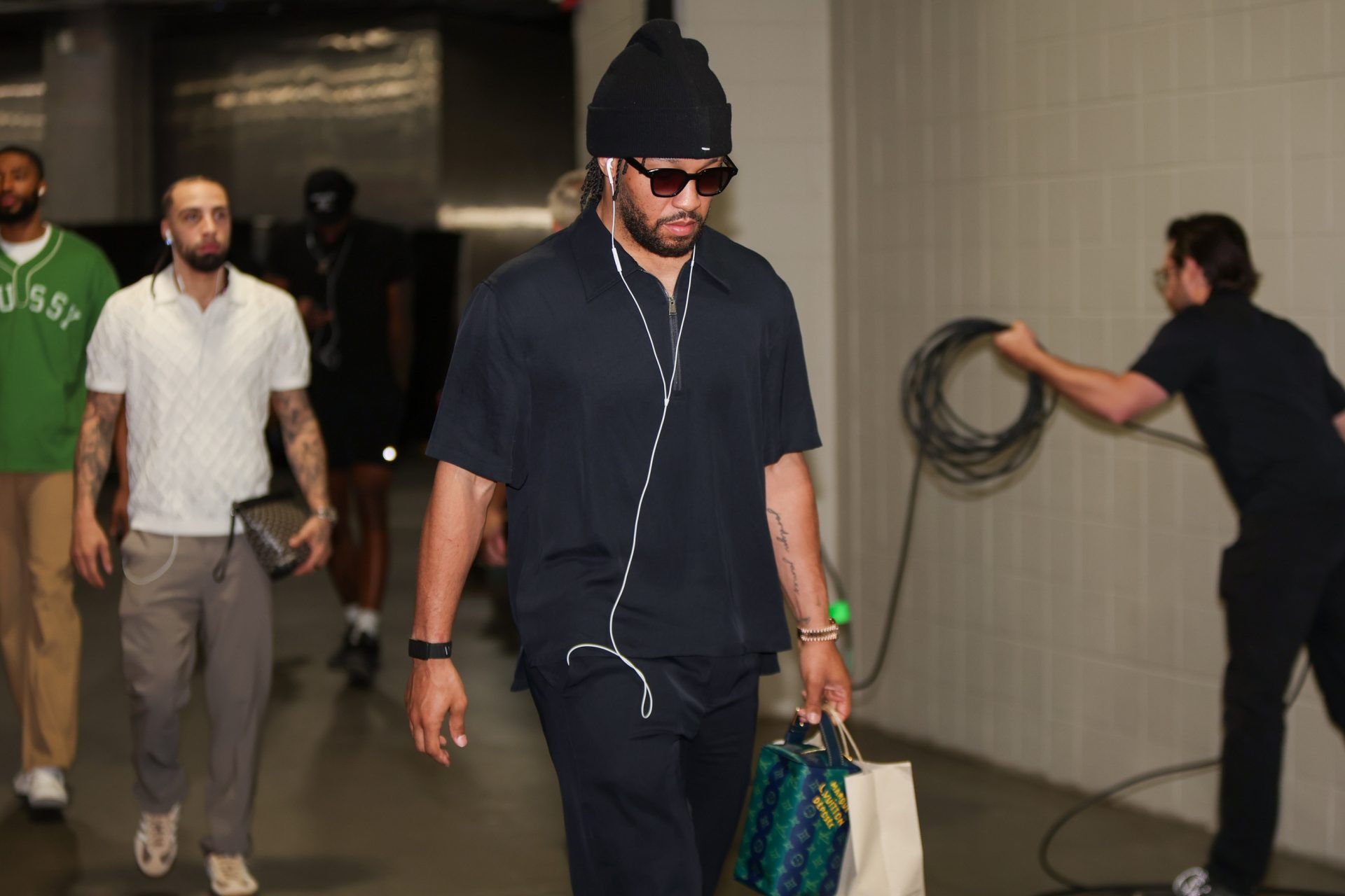 New York Knicks guard Jalen Brunson (11) walks into State Farm Arena before a game against the Atlanta Hawks during game three of the first round of the 2026 NBA Playoffs - Source: Imagn Images
