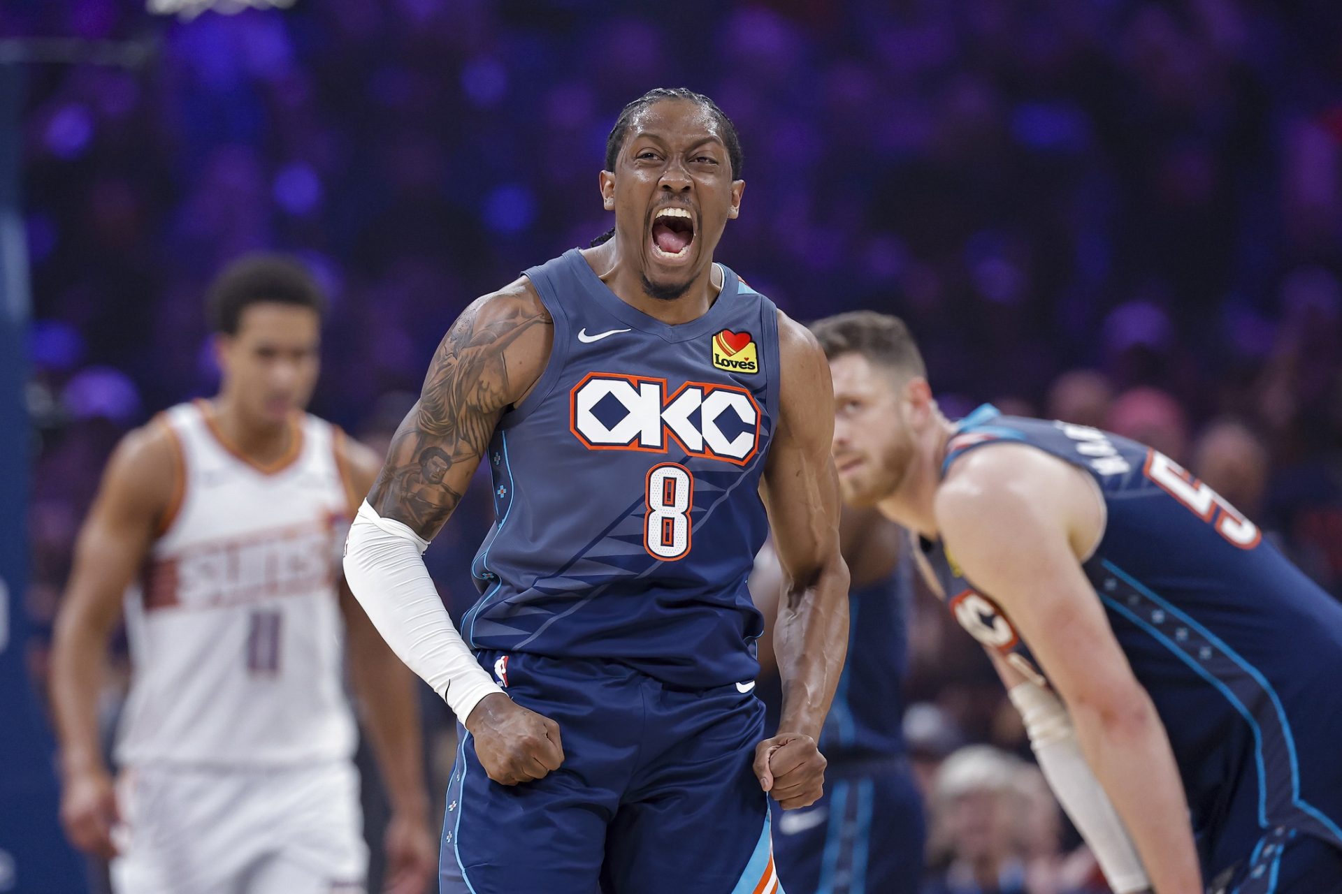 Oklahoma City Thunder guard Jalen Williams (8) screams after dunking against the Phoenix Suns in the first half during game two of the first round of the 2026 NBA Playoffs at Paycom Center.