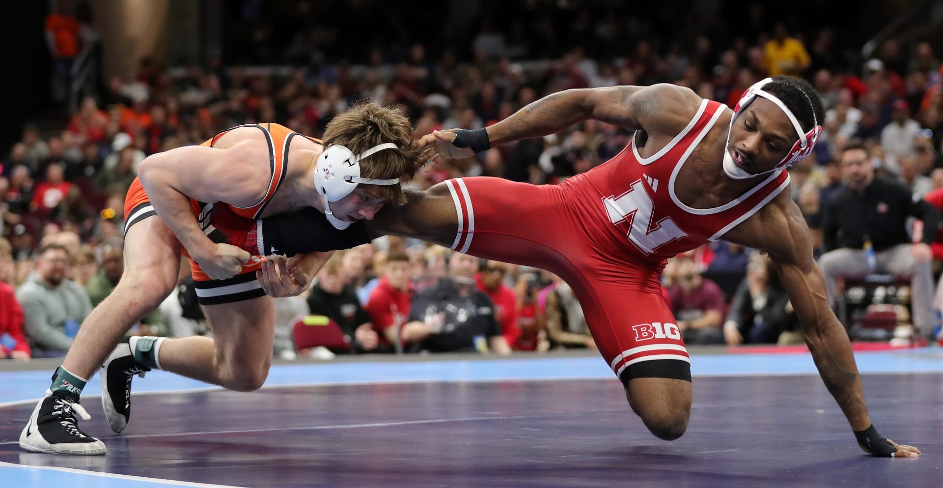 Oklahoma State’s Brandon Cannon, left, wrestles Nebraska’s Antrell Taylor  - IMAGN