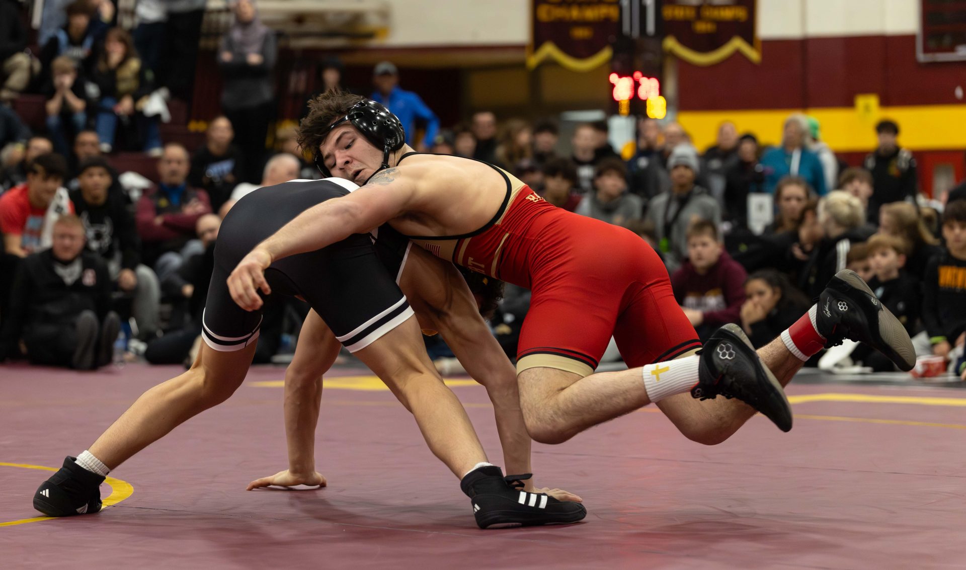 Bishop McCort (Pa.) High School’s Bo Bassett wrestles Faith Christian Academy’s Joe Bachmann in a Ironman wrestling tournament championship match, Saturday, Dec. 13, 2025, at Walsh Jesuit. Source: Imagn