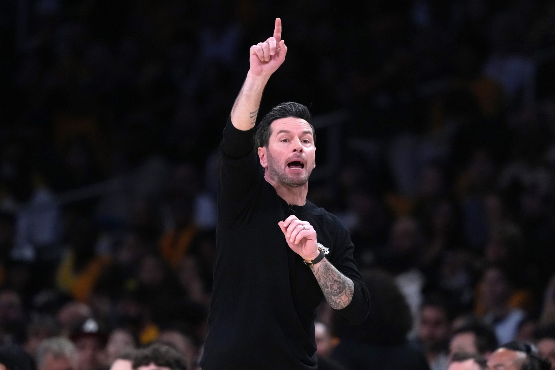 Los Angeles Lakers head coach JJ Redick reacts in the first half against the Houston Rockets during game one of the first round of the 2026 NBA Playoffs at Crypto.com Arena. - Source: Imagn