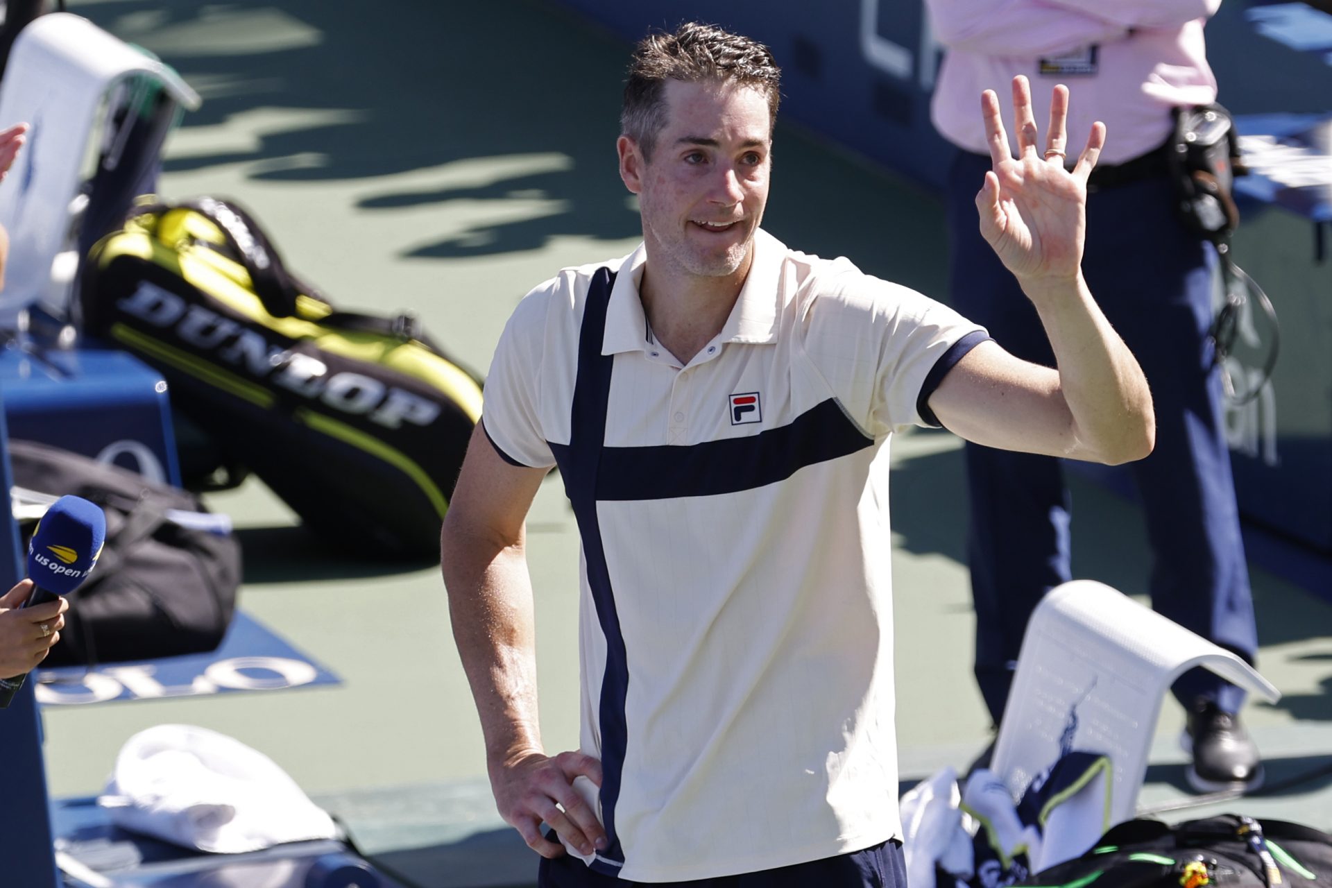 John Isner waves to the crowd at 2023 U.S. Open. Source: IMAGN