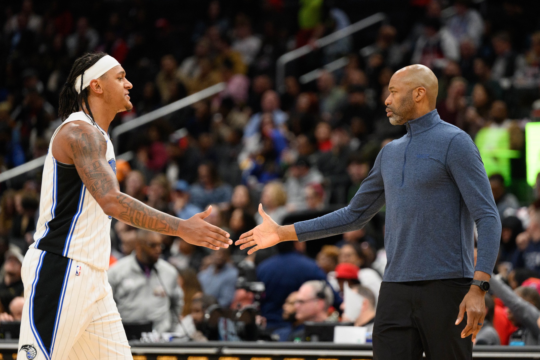 Orlando Magic forward Paolo Banchero (5) and head coach Jamahl Mosley react during the second quarter against the Washington Wizards at Capital One Arena. - Source: Imagn