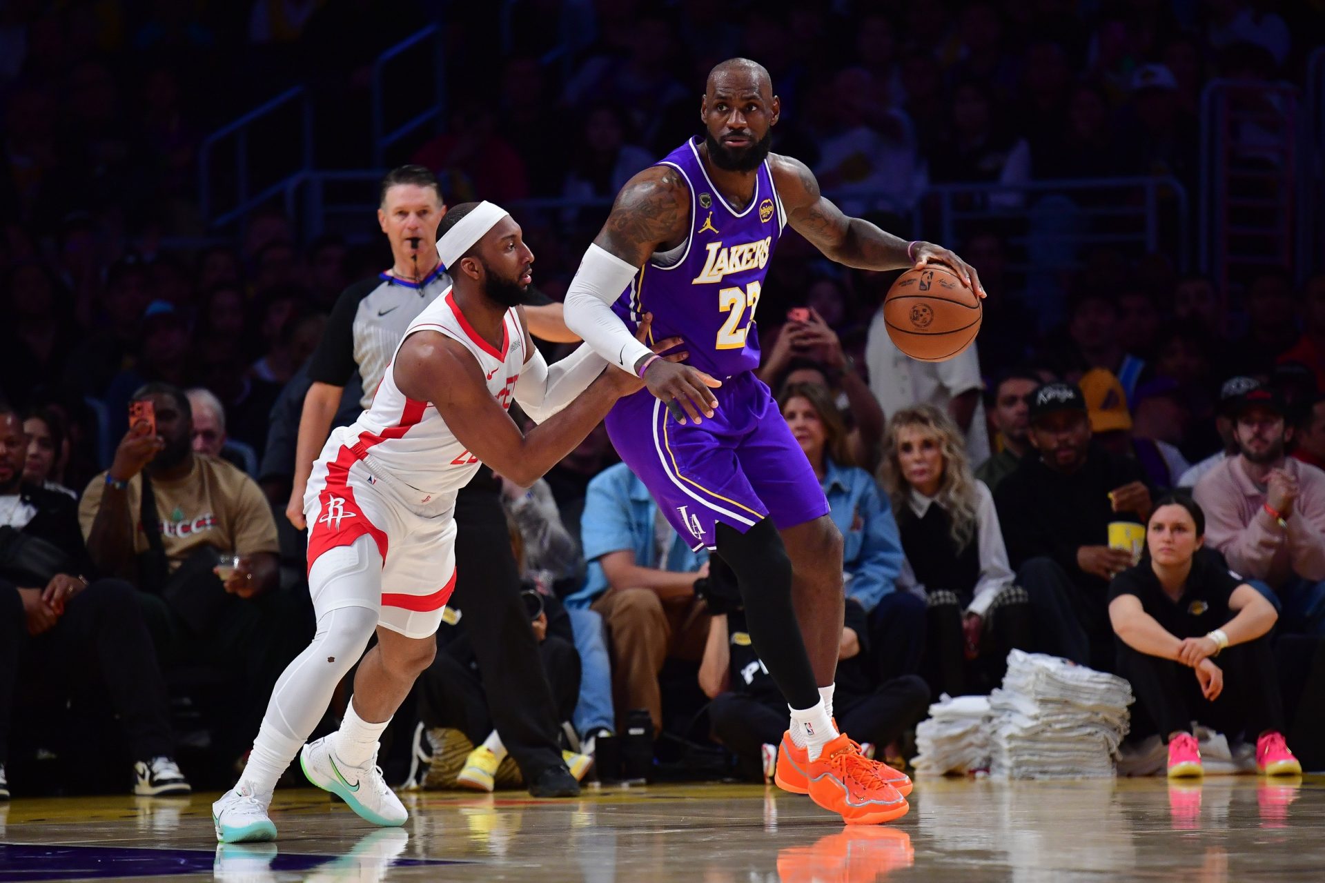 Los Angeles Lakers forward LeBron James (23) moves the ball against Houston Rockets guard Josh Okogie (20) during the second half in Game 5 of the first round of the 2026 NBA Playoffs at Crypto.com Arena. - Source: Imagn