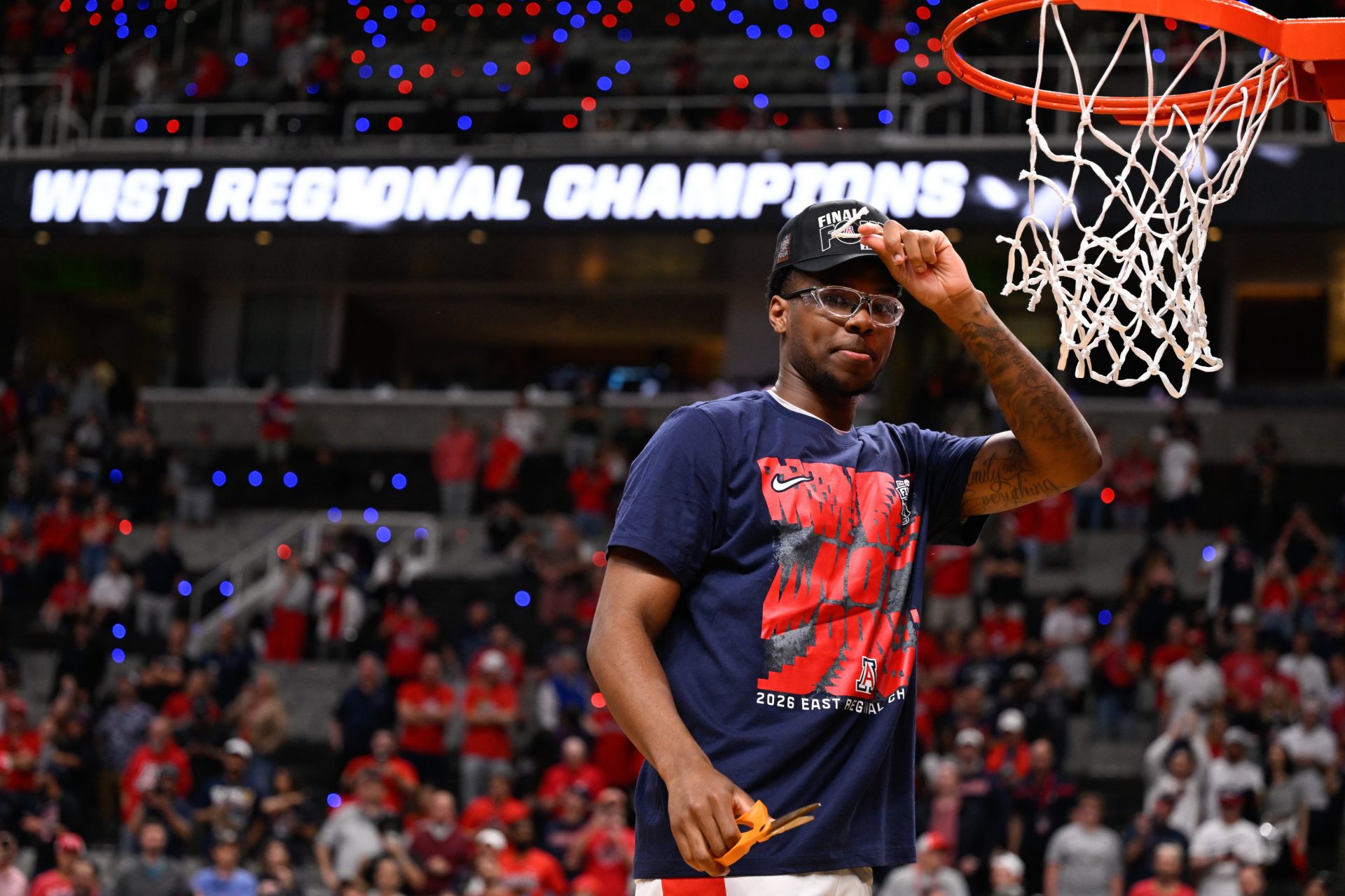 Arizona Wildcats guard Bryce James (6) holds up a piece of the net after an Elite Eight game against the Purdue Boilermakers of the West Regional of the men's 2026 NCAA Tournament at SAP Center.
Source: Imagn