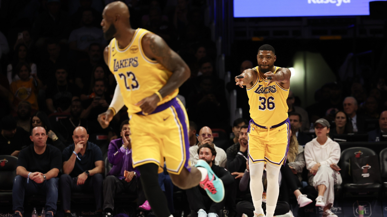 Los Angeles Lakers guard Marcus Smart (36) reacts after Los Angeles Lakers forward LeBron James (23) shot against the Miami Heat during the second half at Kaseya Center.