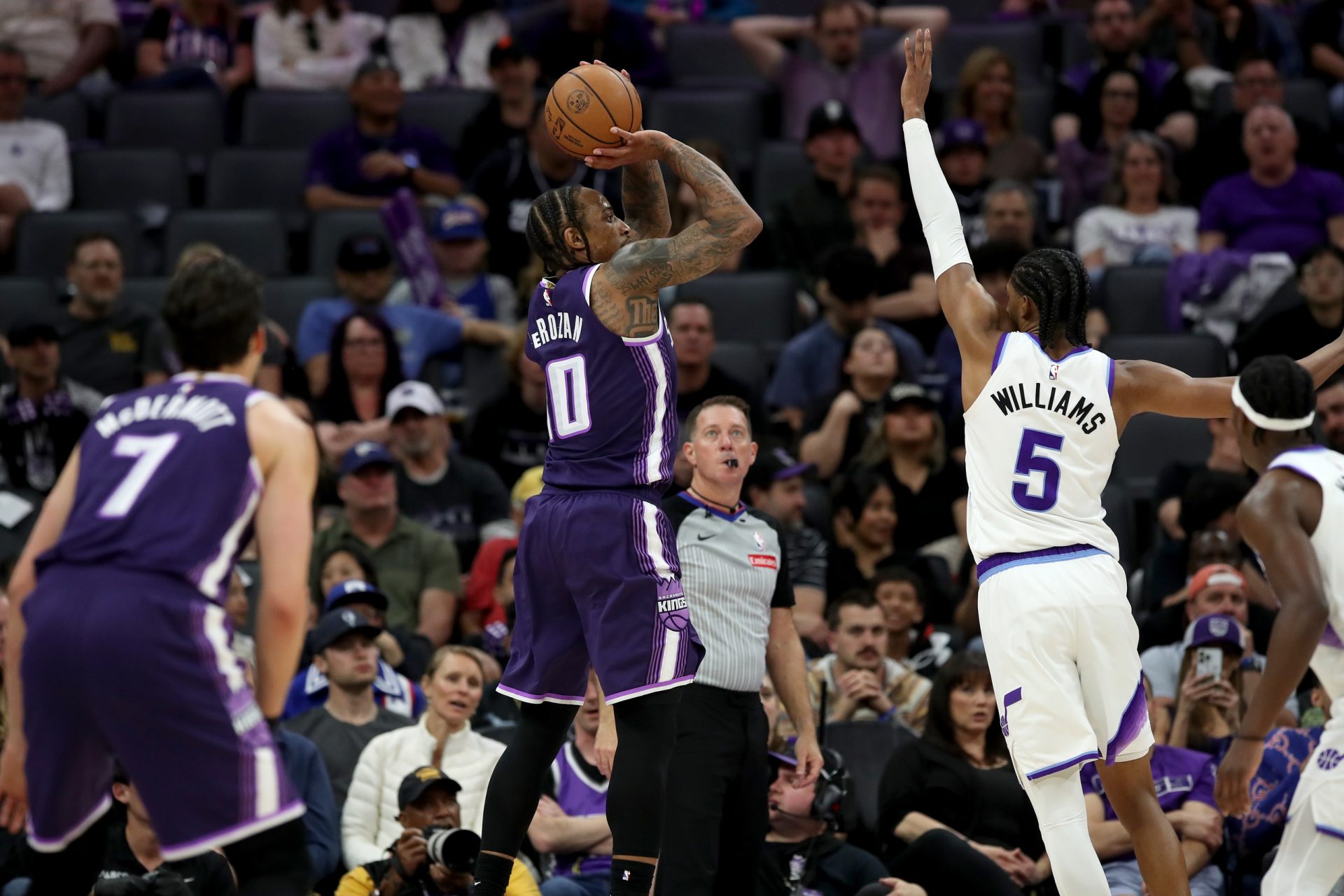 Sacramento Kings guard-forward DeMar DeRozan (10) shoots over Utah Jazz forward Cody Williams (5) during the fourth quarter at Golden 1 Center - Source: Imagn Images