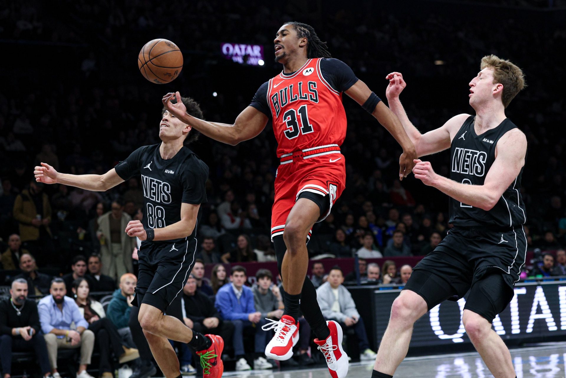 Chicago Bulls guard Jaden Ivey (31) is fouled by Brooklyn Nets guard Nolan Traore (88) during the first quarter at Barclays Center. - Source: Imagn