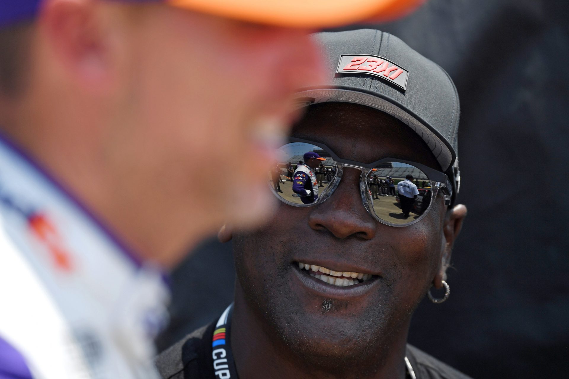 Team 23XI owner Michael Jordan talks with NASCAR Cup Series driver Denny Hamlin (11) after his first qualifying run for the Ally 400 at Nashville Superspeedway - Source: USA TODAY Sports
