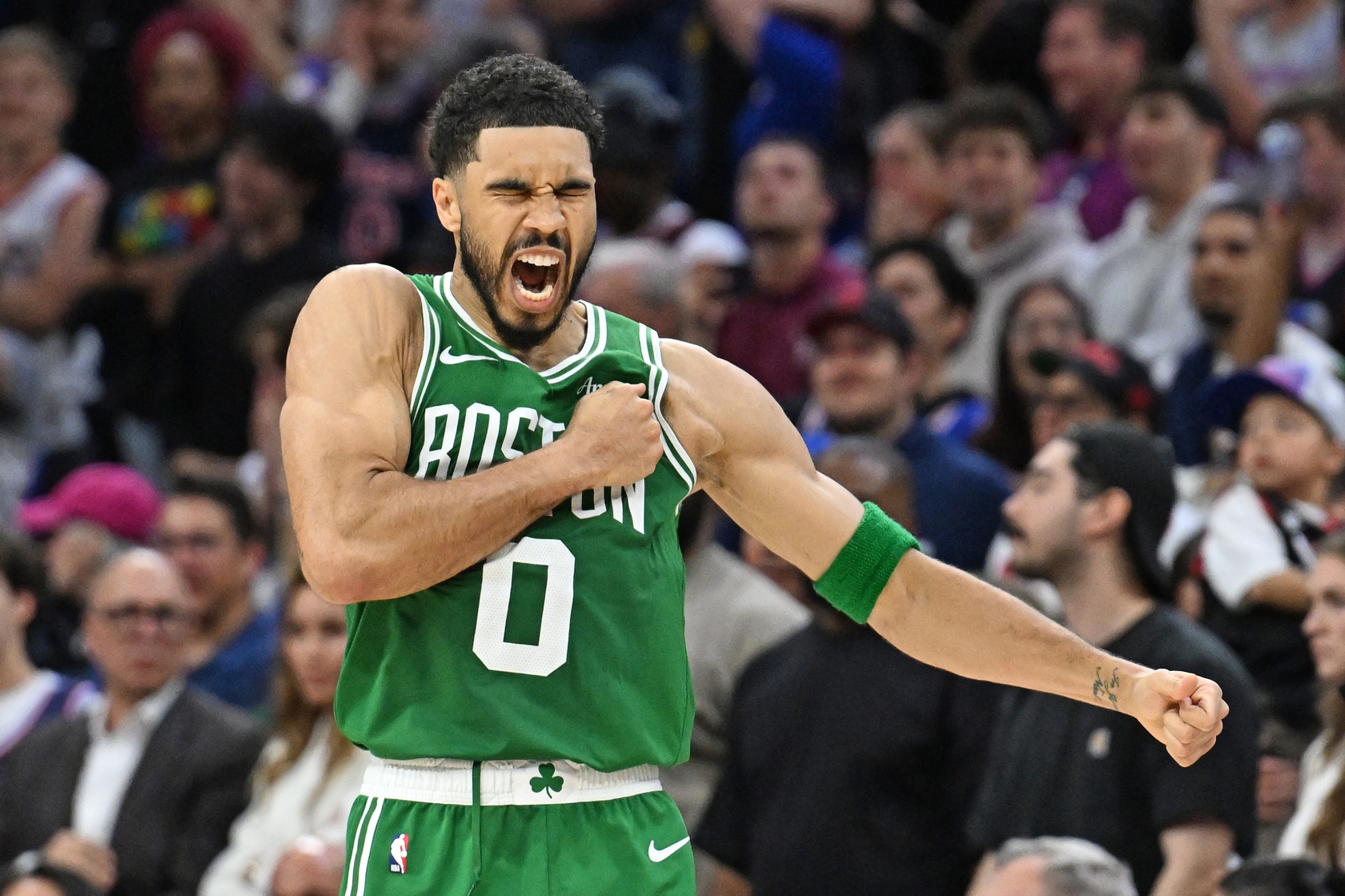 Boston Celtics forward Jayson Tatum (0) celebrates his three point basket against the Philadelphia 76ers late in the fourth quarter at Xfinity Mobile Arena. - Source: Imagn