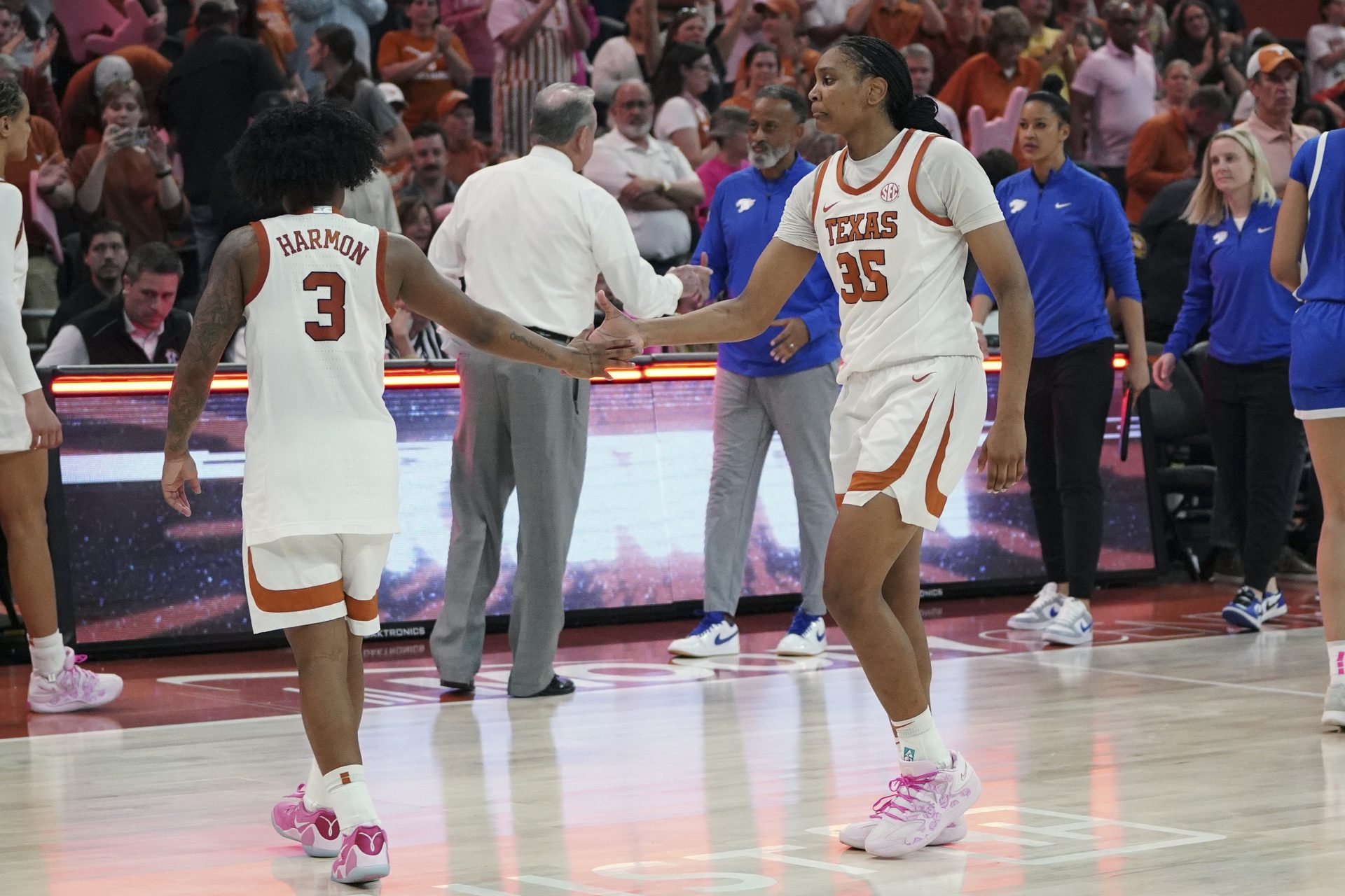 Texas Longhorns forward Madison Booker (35) and guard Rori Harmon (3) celebrate a 64-53 win against the Kentucky Wildcats after the game at Moody Center. Source: Dustin Safranek-Imagn Images
