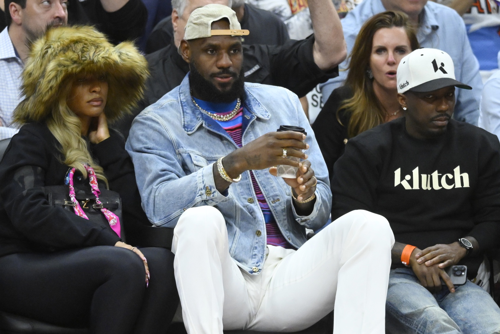 Savannah James, LeBron James and Rich Paul sit in the front in the fourth quarter of Game 4 of the second round for the 2024 NBA playoffs between the Cleveland Cavaliers and the Boston Celtics at Rocket Mortgage FieldHouse. - Source: USA Today Network