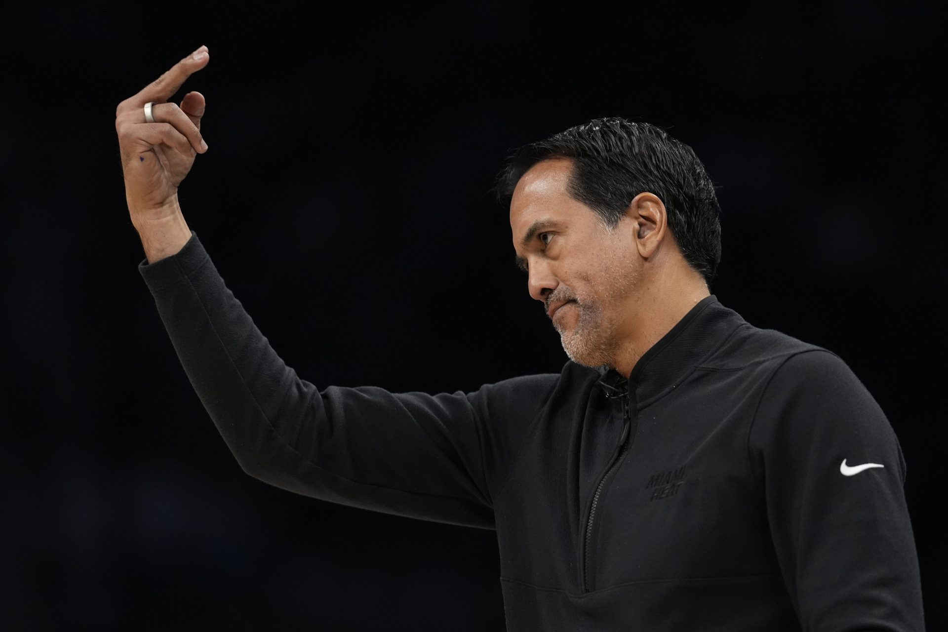 Miami Heat Head Coach Erik Spoelstra motions to his team during the first quarter during the play-in rounds between the Charlotte Hornets and the Miami Heat of the 2026 NBA Playoffs at Spectrum Center. - Source: Imagn