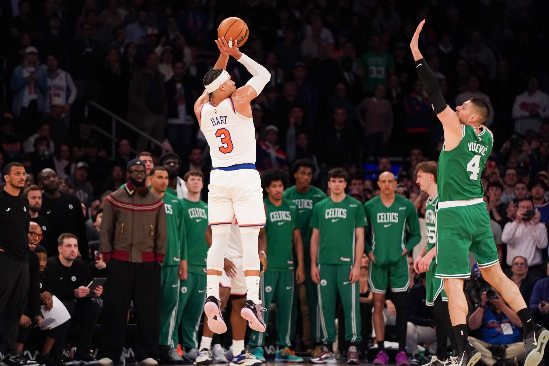 New York Knicks guard Josh Hart (3) hits a three pointer late in the fourth quarter against the Boston Celtics at Madison Square Garden. - Source: Imagn