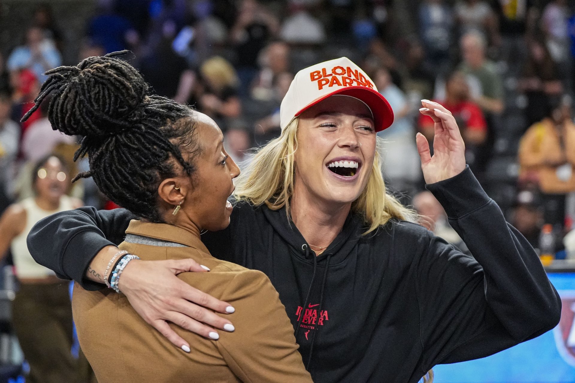 Indiana Fever player Sophie Cunningham (hat)  reacts after The Fever defeated the Atlanta Dream during game three of round one for the 2025 WNBA Playoffs at Gateway Center Arena at College Park - Source: Imagn Images