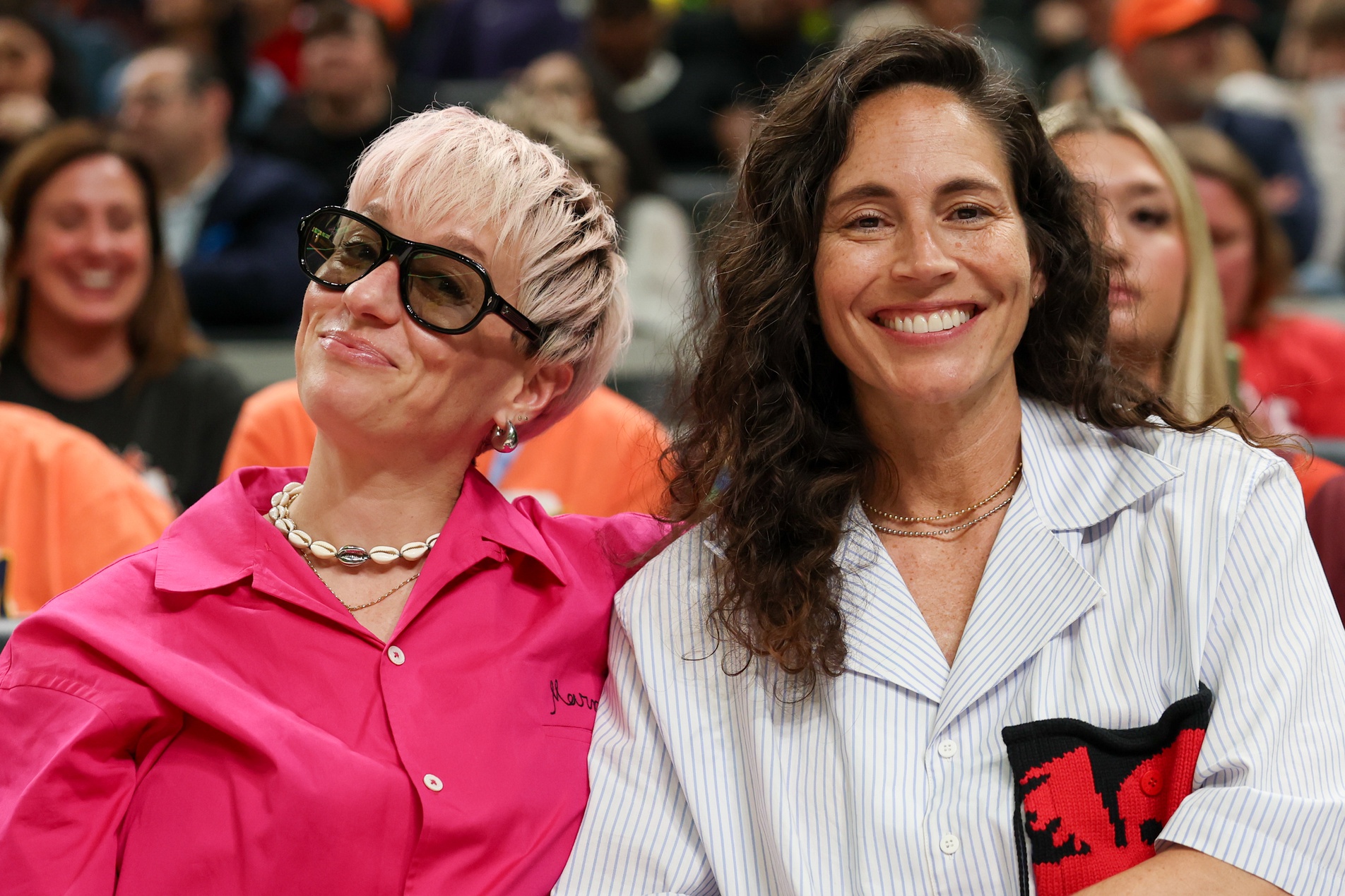 Megan Rapinoe and Sue Bird pose for a photo during the 2025 WNBA All Star Skills Challenge at Gainbridge Fieldhouse. - Source: Imagn
