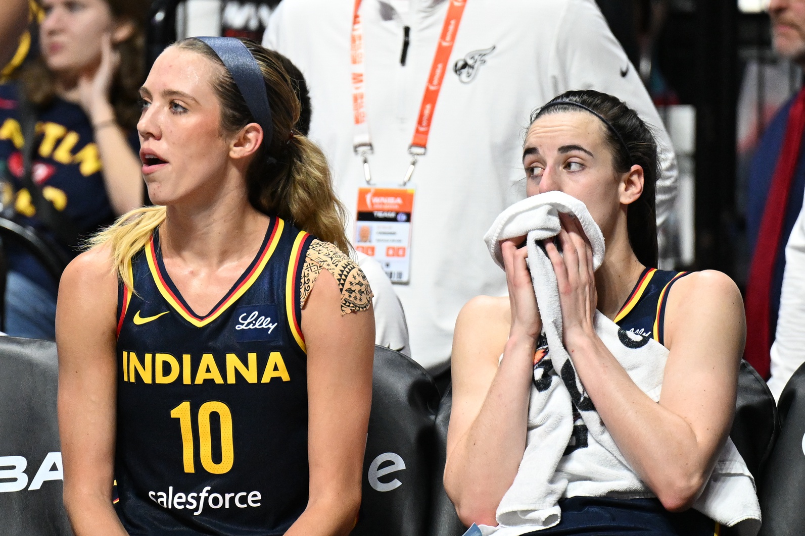 Indiana Fever guard Lexie Hull (10) and Indiana Fever guard Caitlin Clark (22) watch from the bench in the fourth quarter during game one of the first round of the 2024 WNBA Playoffs at Mohegan Sun Arena - Source: Imagn Images