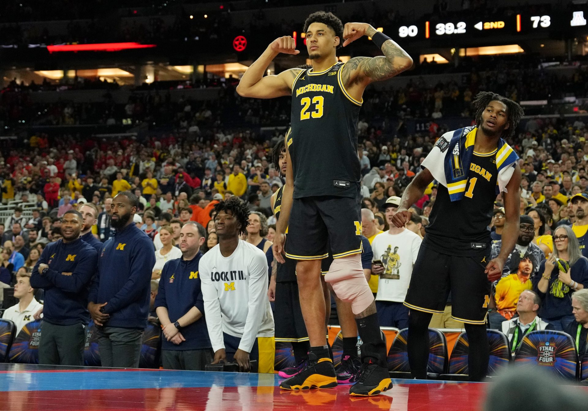 Michigan Wolverines forward Yaxel Lendeborg (23) celebrates during the second half in a semifinal of the Final Four of the men's 2026 NCAA Tournament at Lucas Oil Stadium - Source: Imagn